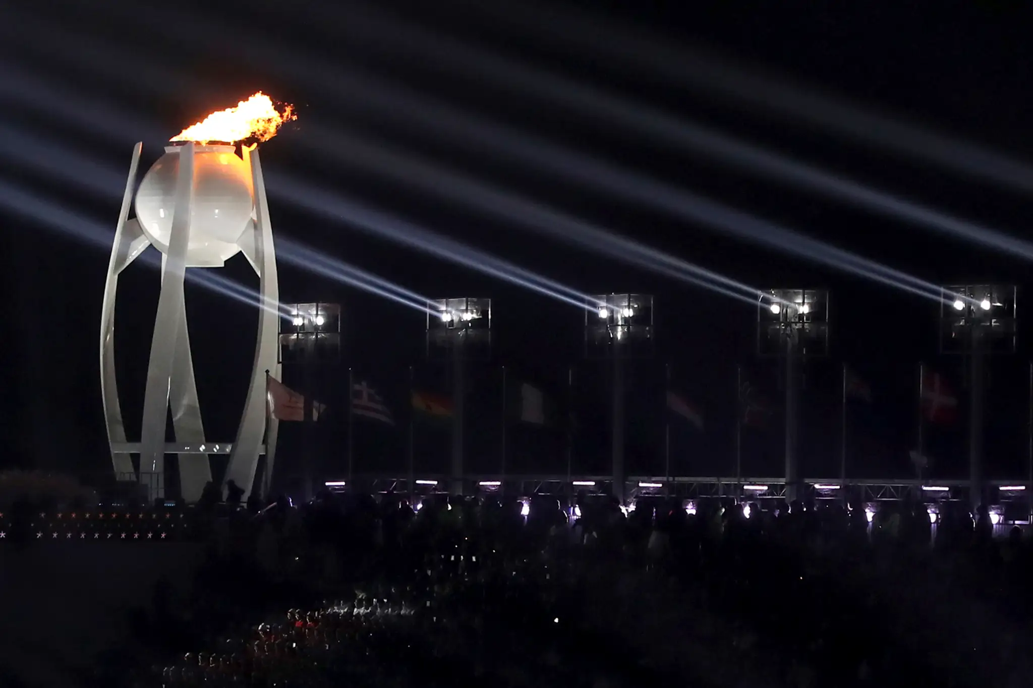 Športovci KĽDR a Južnej Kórey spoločne kráčajú na štadióne počas otváracieho ceremoniálu ZOH 2018.