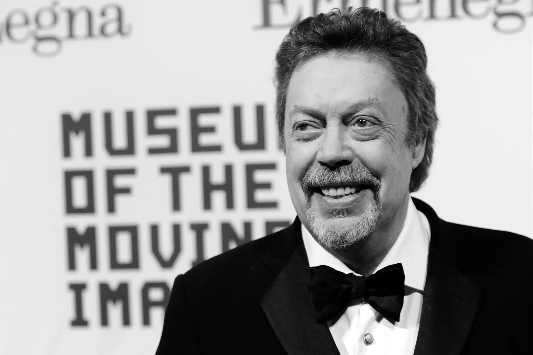 Tim Curry.