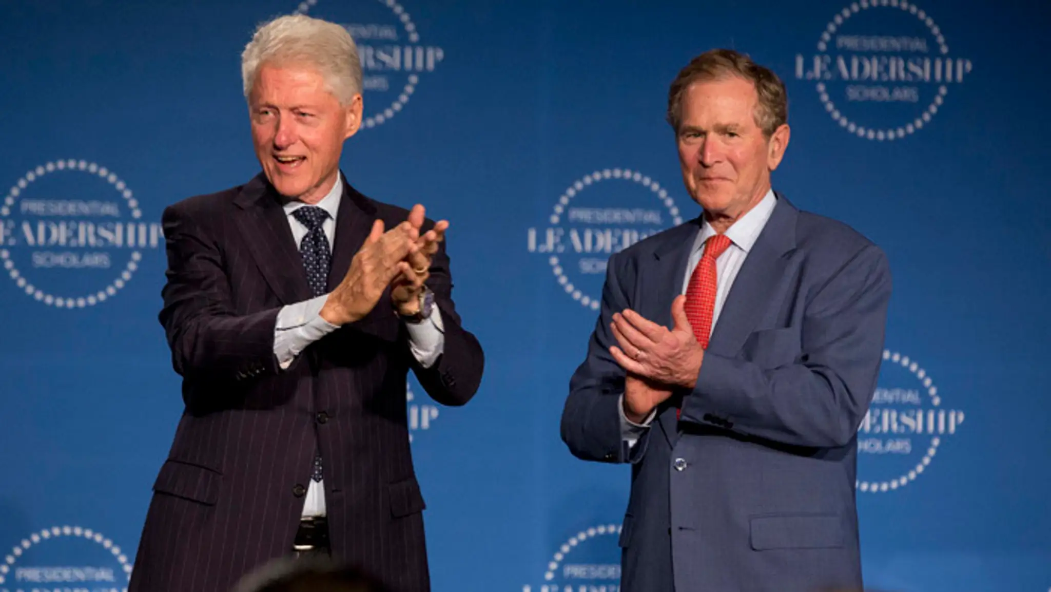 Bill Clinton a George W. Bush.