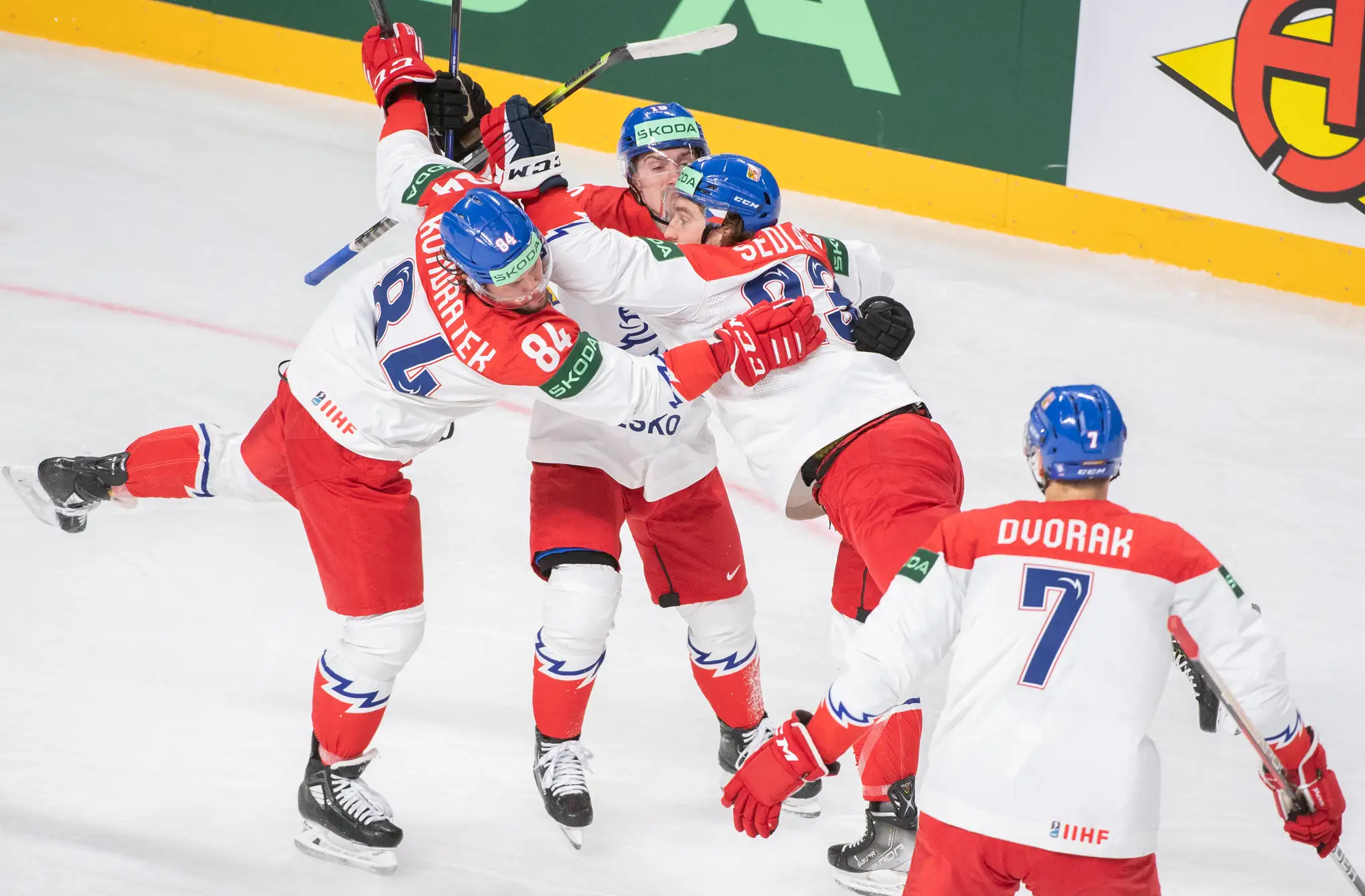 Na snímke českí hokejisti sprava Tomáš Dvořák, Lukáš Sedlák, Jakub Flek a Tomáš Kundrátek sa tešia po strelení gólu.