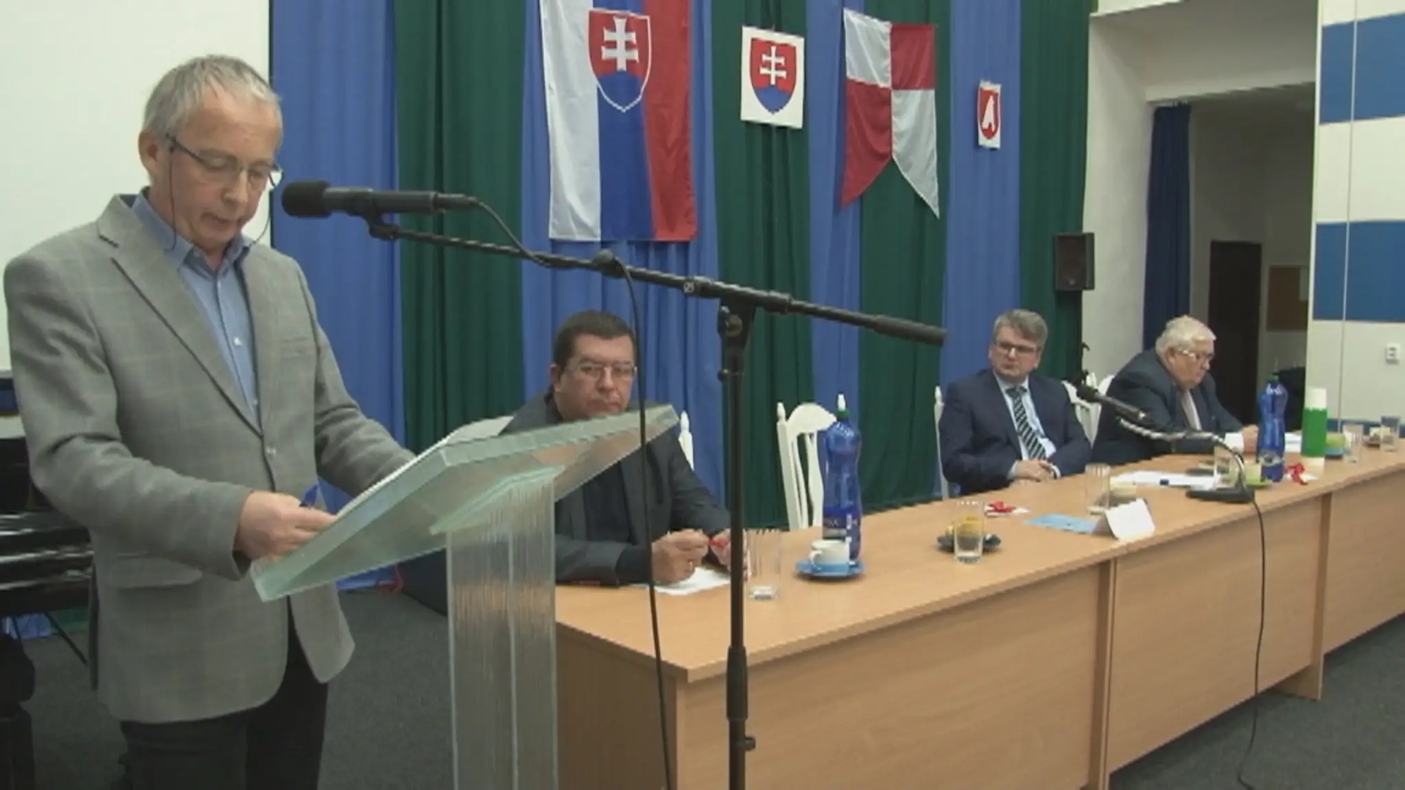 Mestskí poslanci.