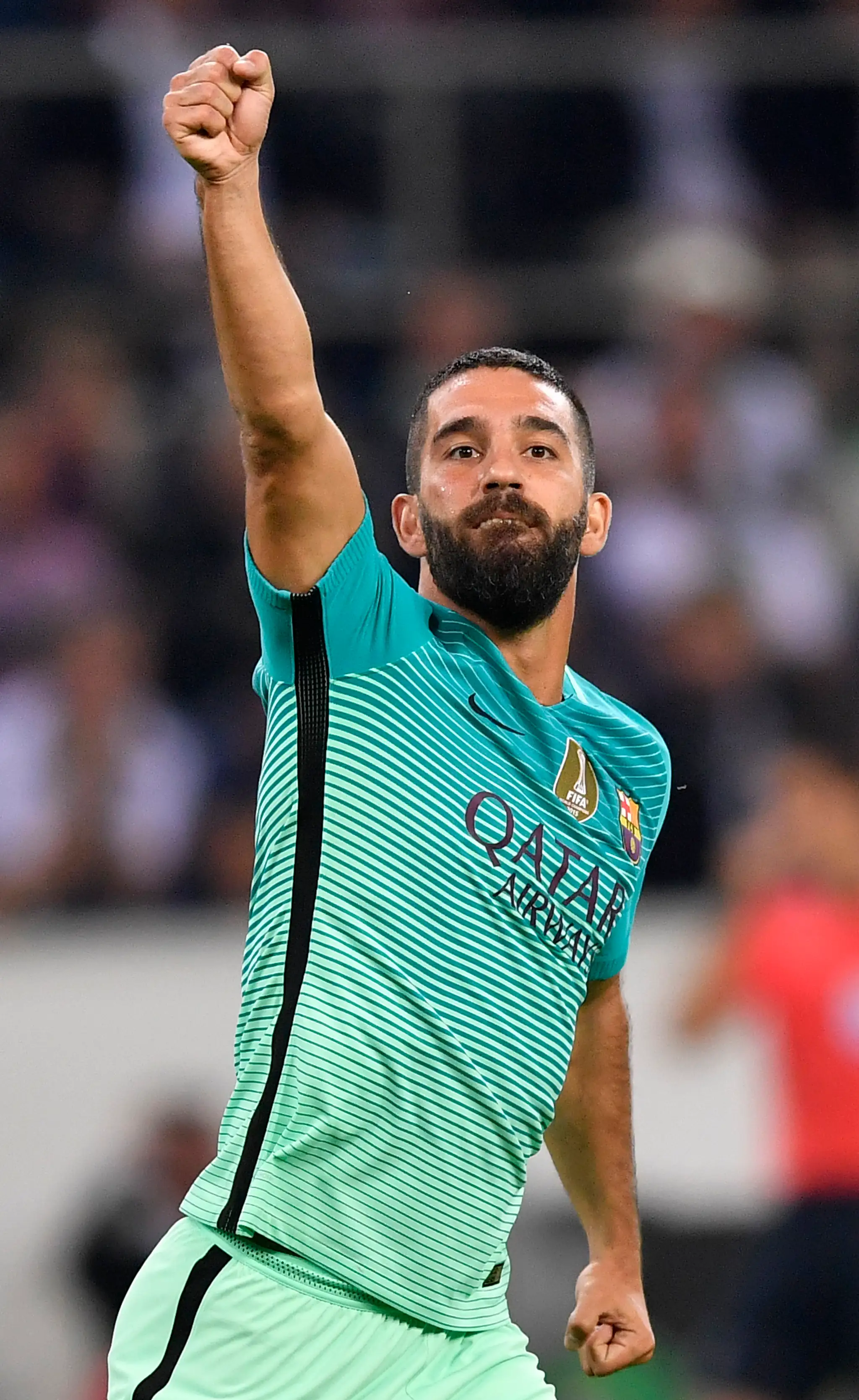 Potešený stredopoliar Barcelony Arda Turan po strelenom góle v dueli LM na pôde Borussie Mönchengladbach.