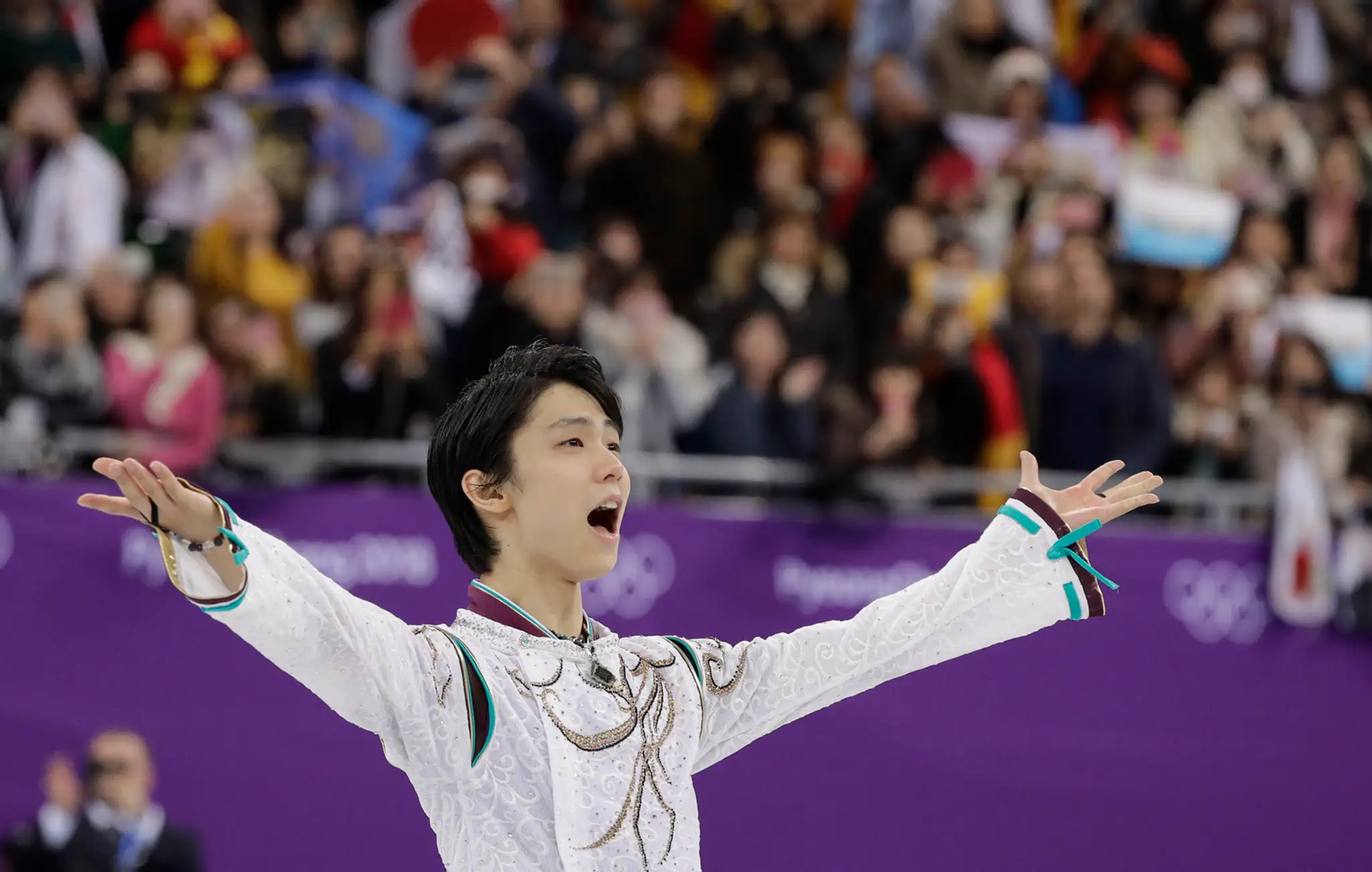 Japonský krasokorčuliar Juzuru Hanju po triumfe na ZOH 2018.