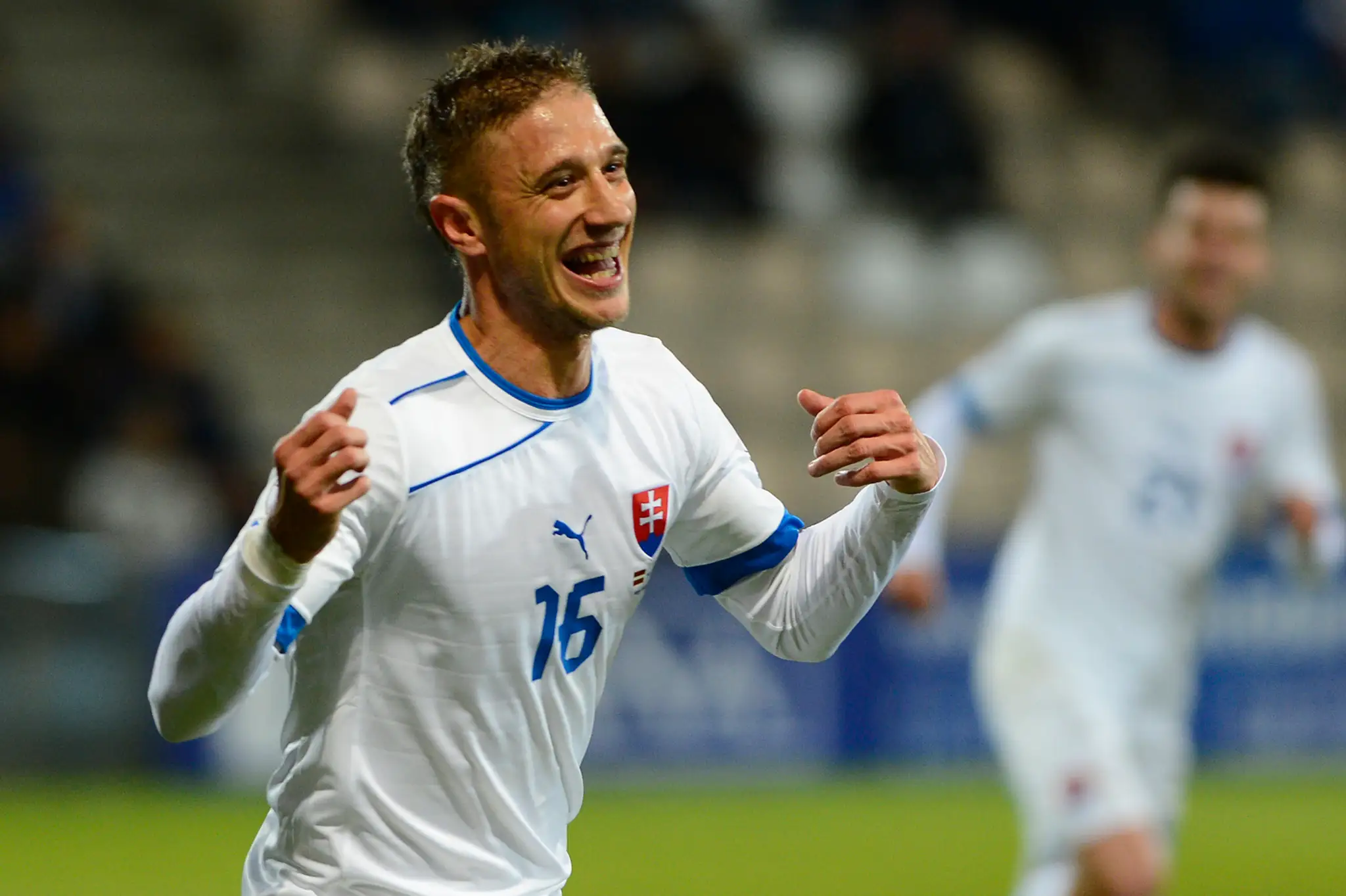 Kornel Saláta sa teší z gólu na 2:0 počas kvalifikačného zápasu na MS 2014 medzi Lotyšskom a Slovenskom.