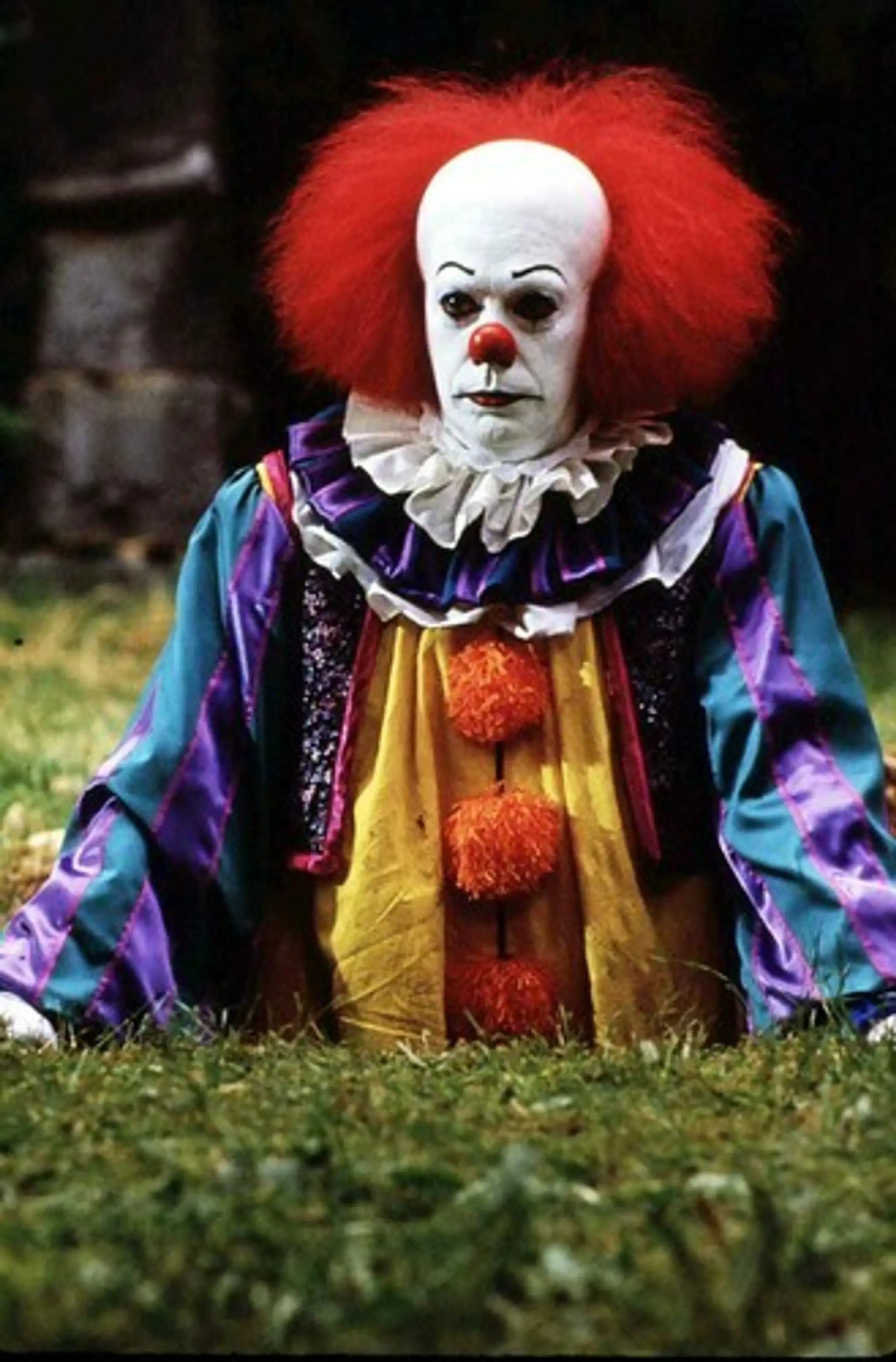Démonický klaun Pennywise z hororu "To" zahral ho herec Tim Curry.