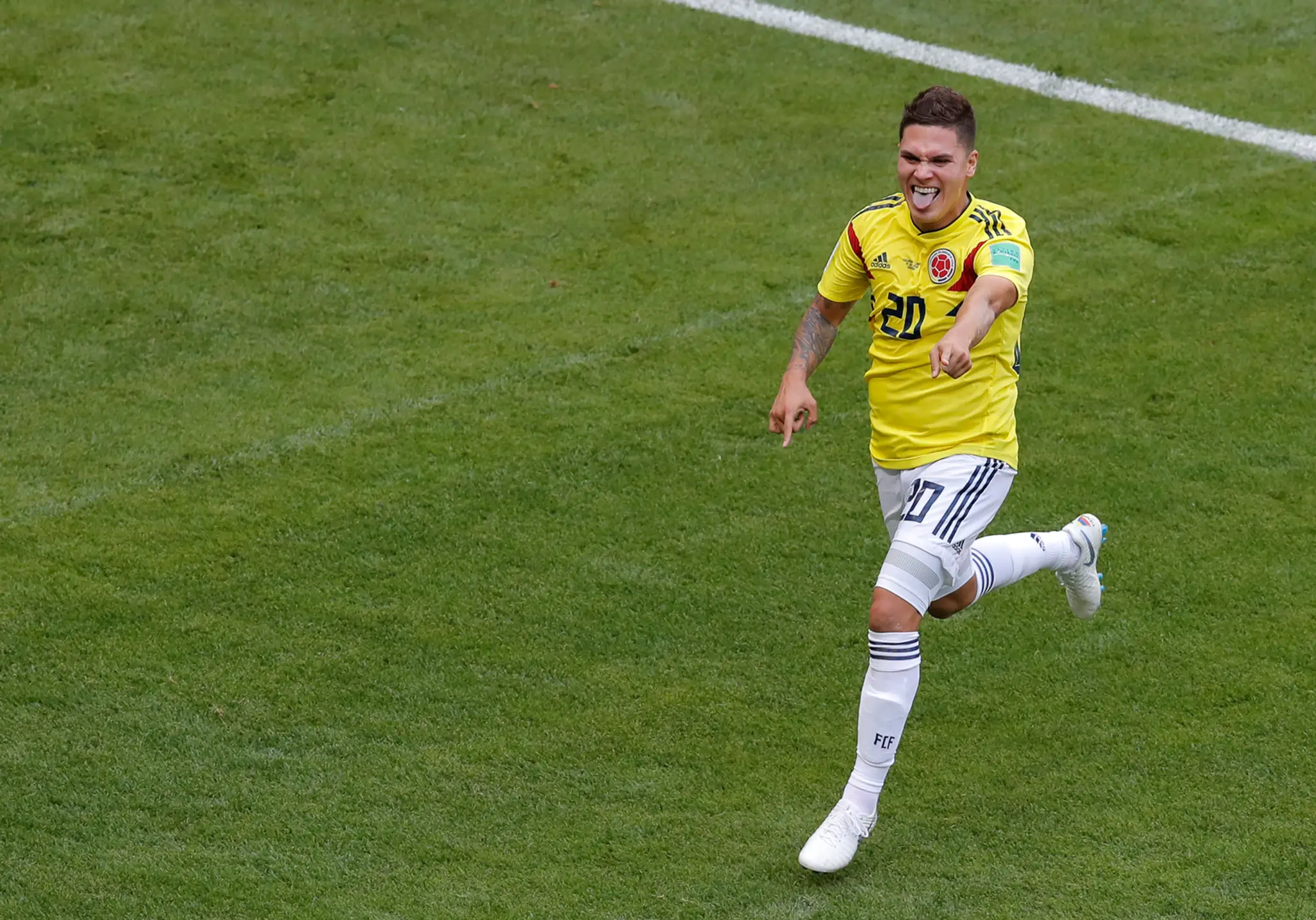 Juan Quintero z Kolumbie jasá po zásahu v stretnutí na MS 2018 proti Japonsku.