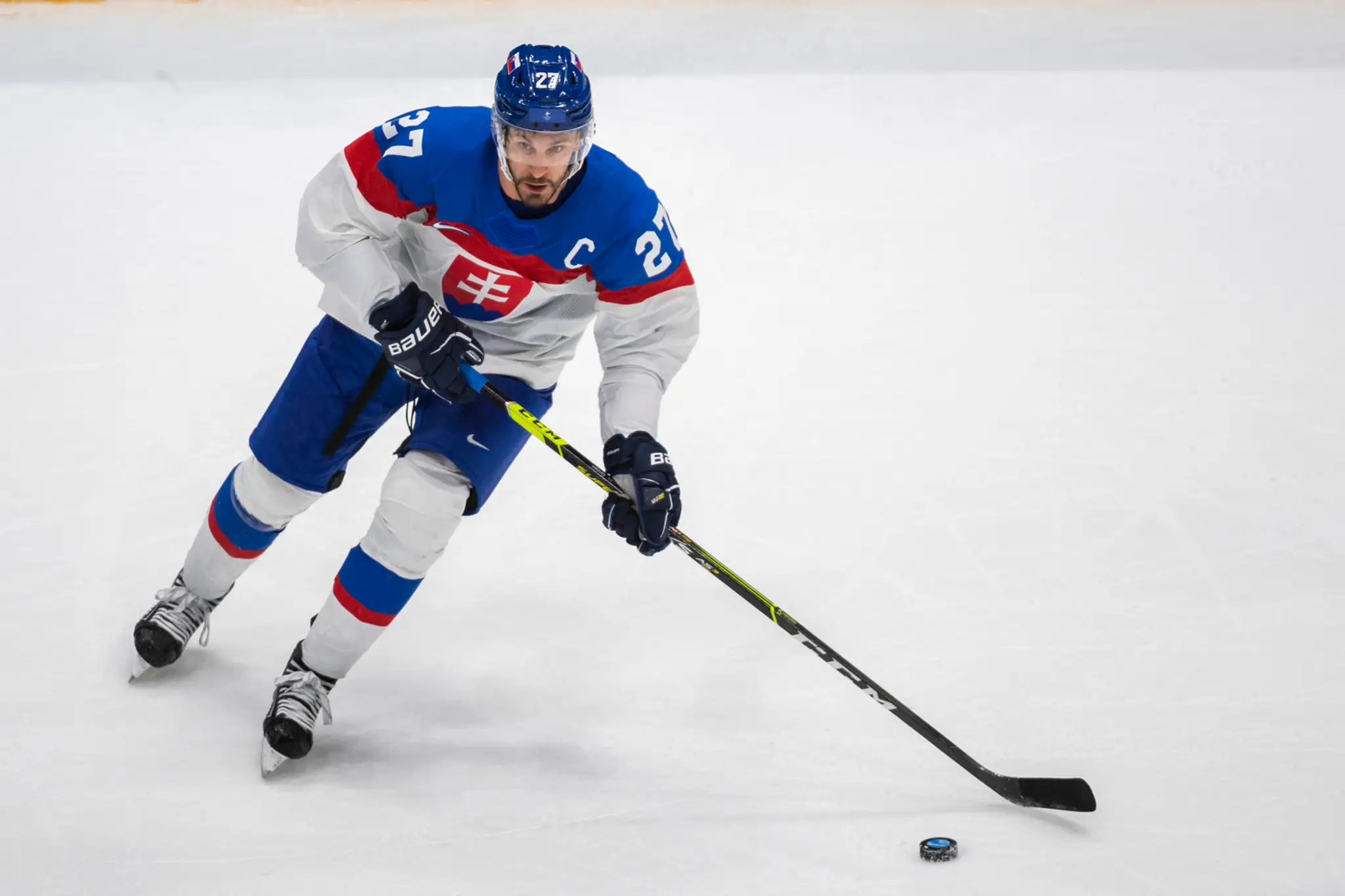 Kapitán slovenskej hokejovej reprezentácie Marek Hrivík v zápase s Fínskom na ZOH 2022.
