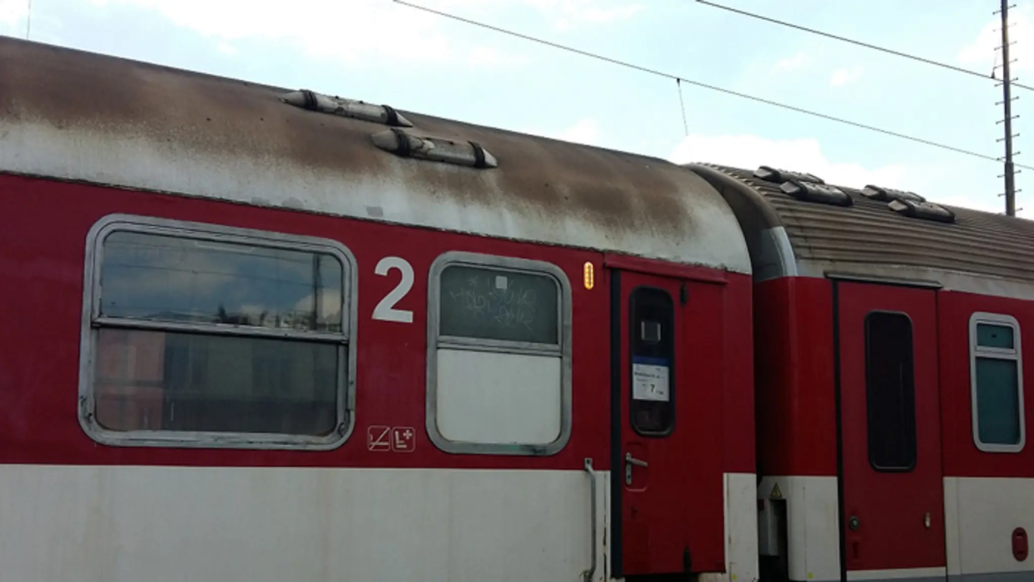 Signalizácia zvonka na vozni 2. triedy.