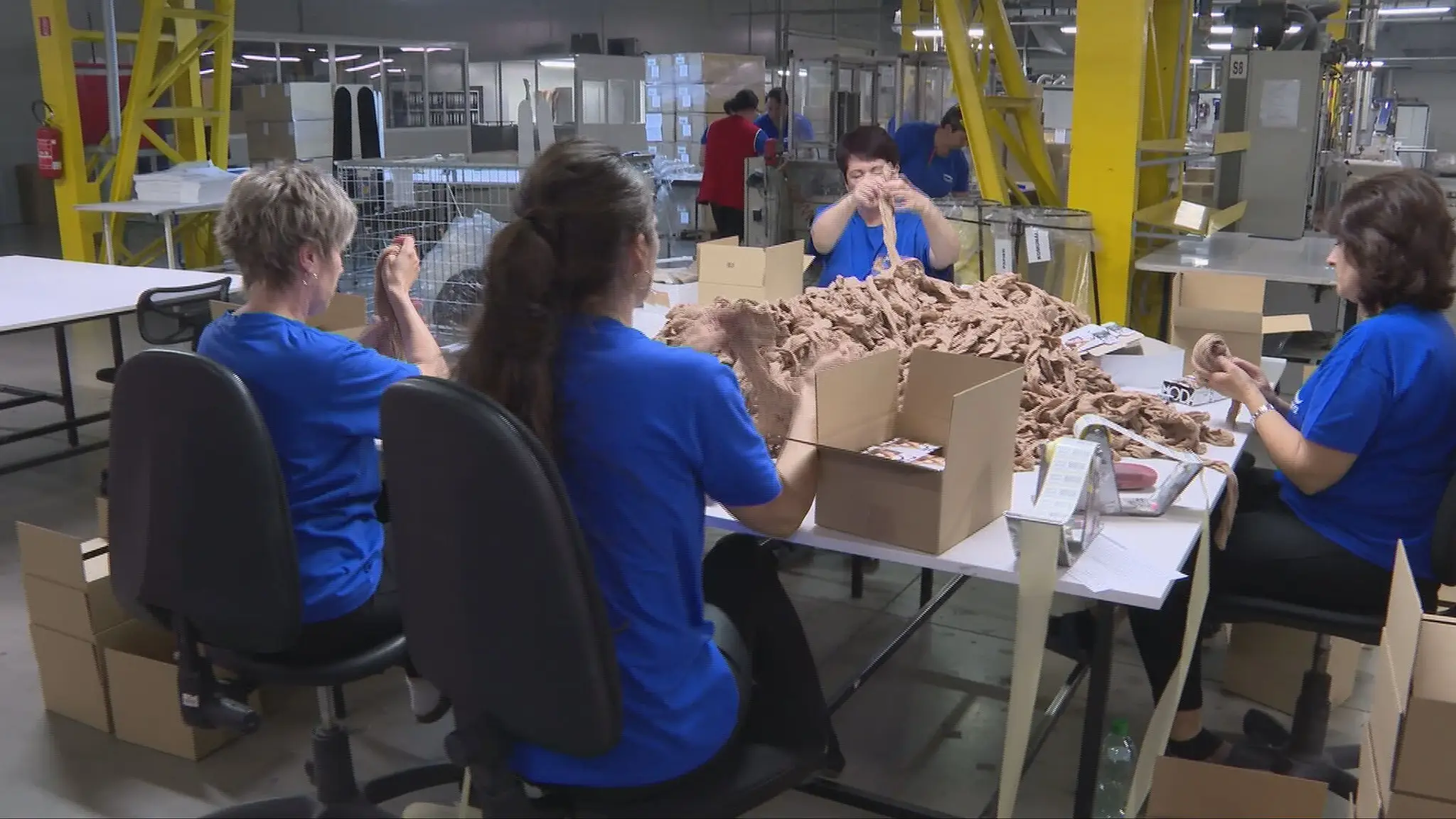 Pracovníčky vo firme na výrobu pančušiek