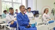 Laborantka Darja Šipilovová na snímke v krúžku.