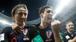 Luka Modrič, Šime Vrsaljko (vľavo) a Ivan Rakitič oslavujú postujúci gól do finále MS.