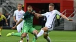 Na snímke vpravo hráč Slovenska Milan Škriniar a hráč Slovinska Tim Matavž v zápase kvalifikácie MS.