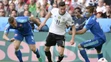 Na snímke uprostred Julian Draxler (Nemecko) a hráči Slovenska Ján Ďurica (vľavo) a Peter Pekarík na ME.