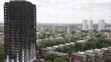 Vyhorená výšková obytná budova Grenfell Tower v západnej časti Londýna