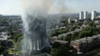 Tlejúca zvyšky Grenfell Tower.