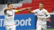 Na snímke zľava hráči AS Trenčín Jakub Kadák a Adam Tučný sa tešia po góle.