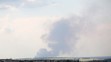 Na snímke z konca júna vidno dym po ostreľovaní ukrajinského mesta Lyman.