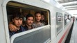Migranti vo vlaku - ilustračné foto.