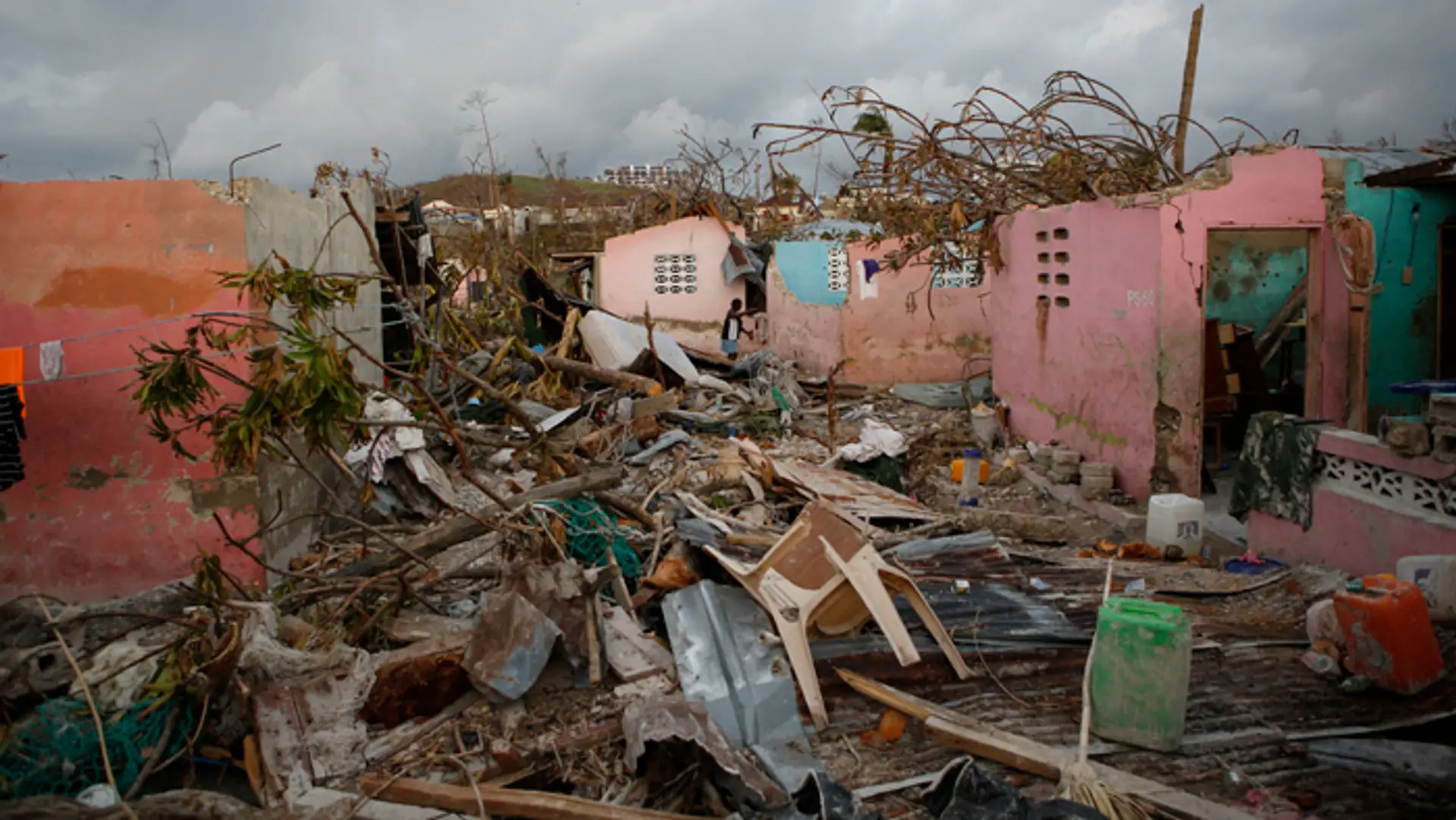 Zničené domy na Haiti.