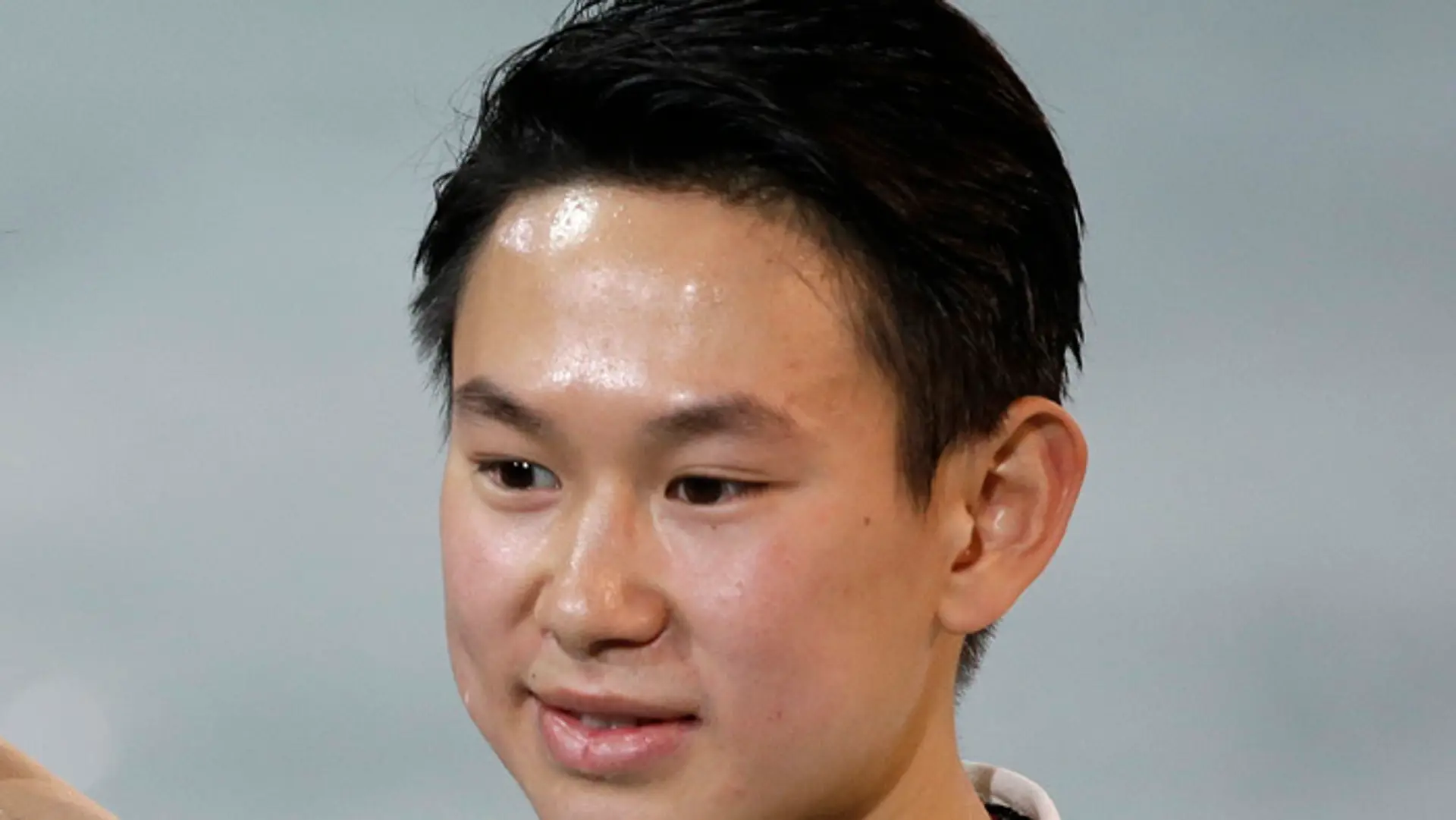 Bronzový medailista z olympiády zo Soči Denis Ten na archívnej snímke.