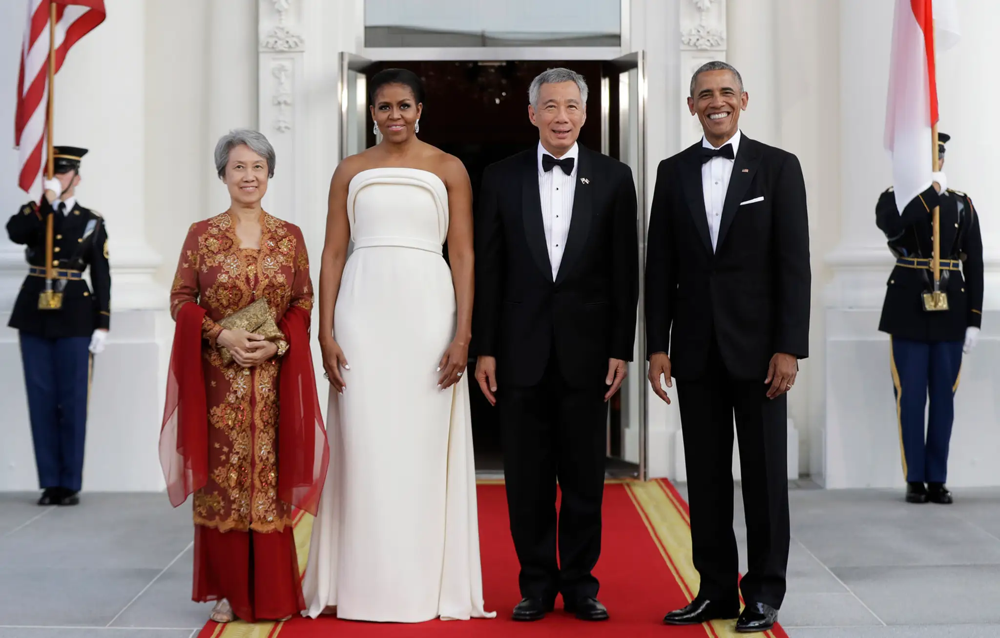 Americký prezident Barack Obama, jeho manželka Michelle Obamová a singapurský premiér Lee Hsien Loong s manželkou.