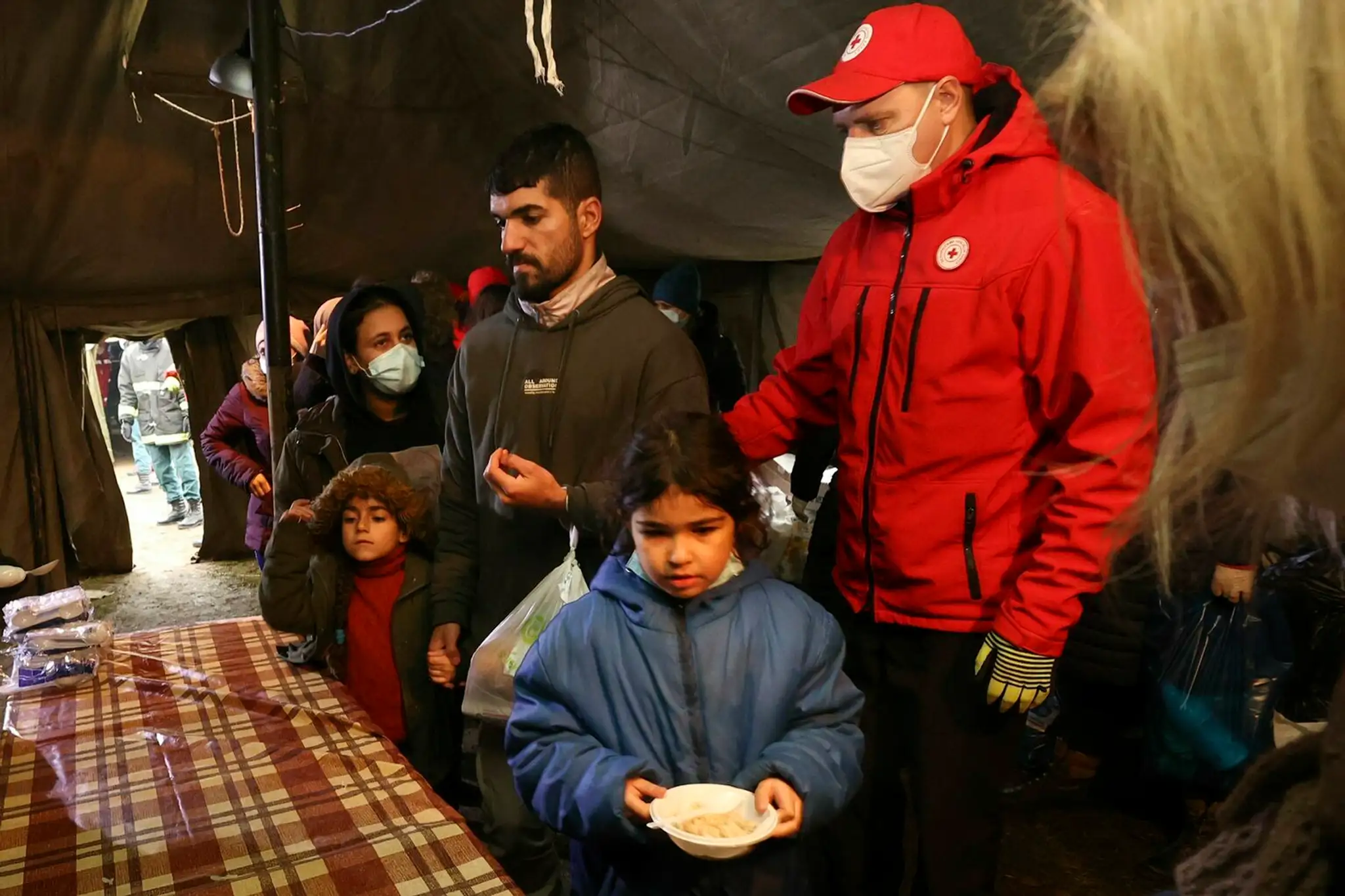 Migranti, väčšinou zo Sýrie či Iraku, na poľsko-bieloruskej hranici