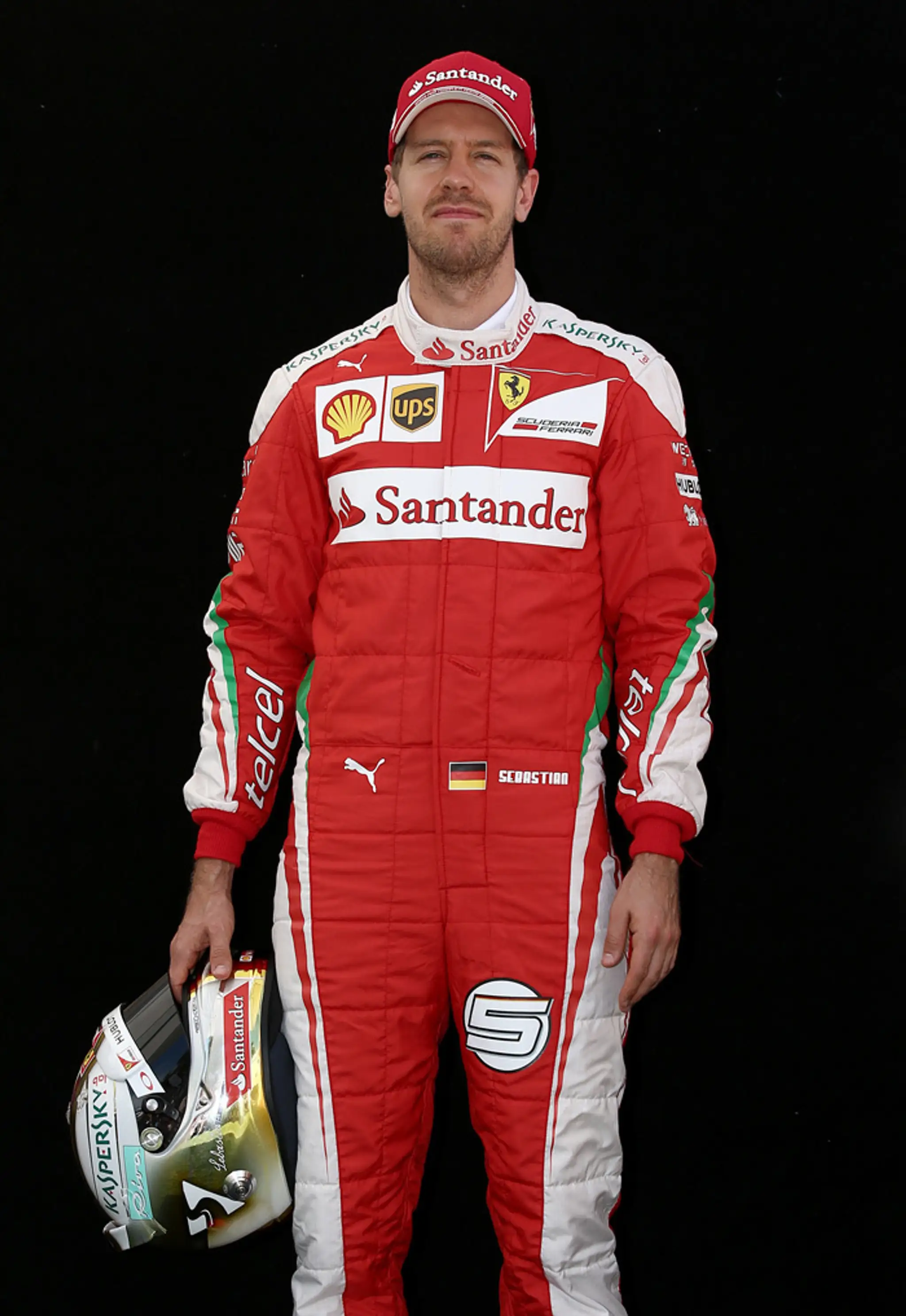 Nemecký jazdec tímu Ferrari  Sebastian Vettel.