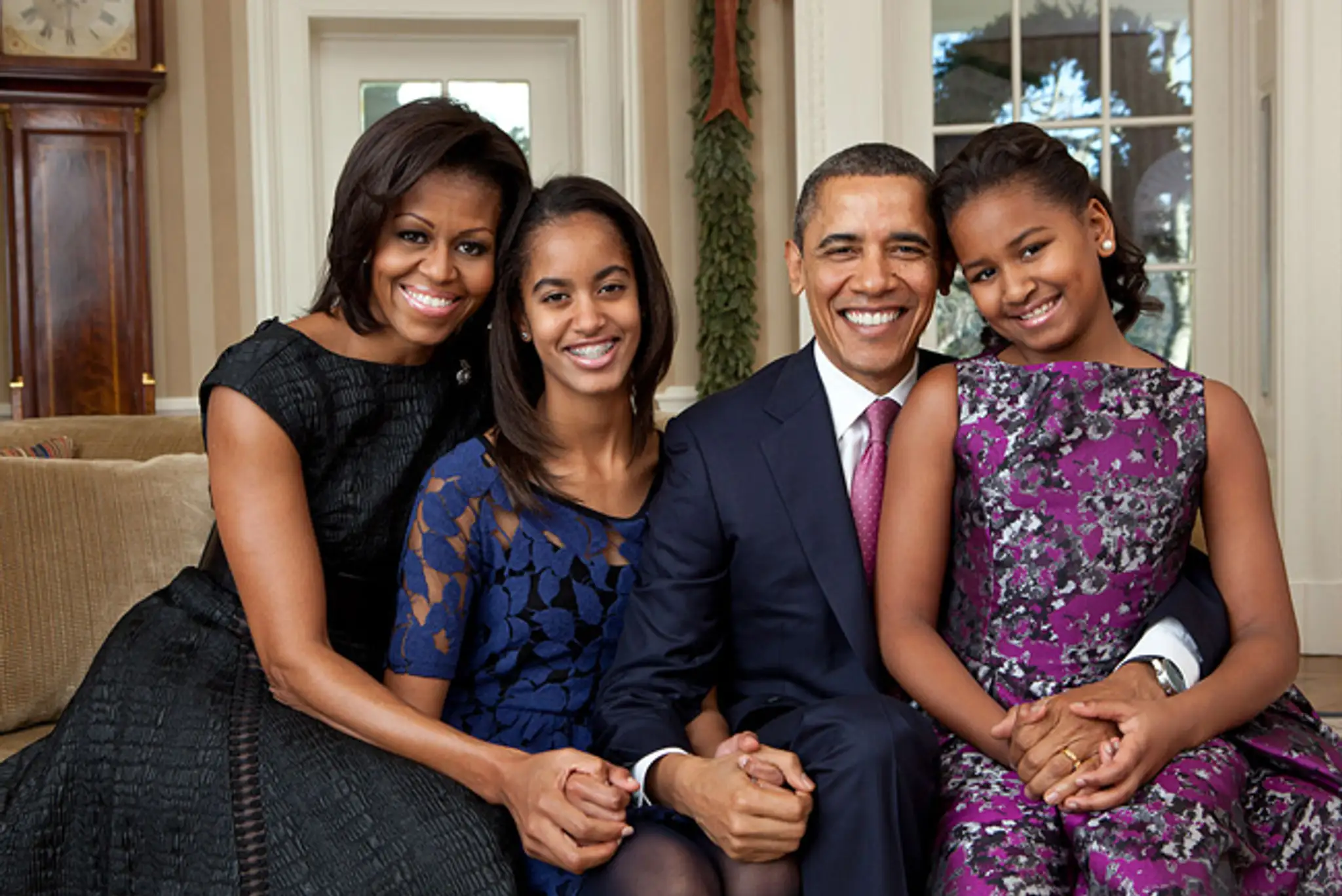 Rodina Obamovcov - Barack s dcérami Sashou a Maliou a manželkou Michelle.