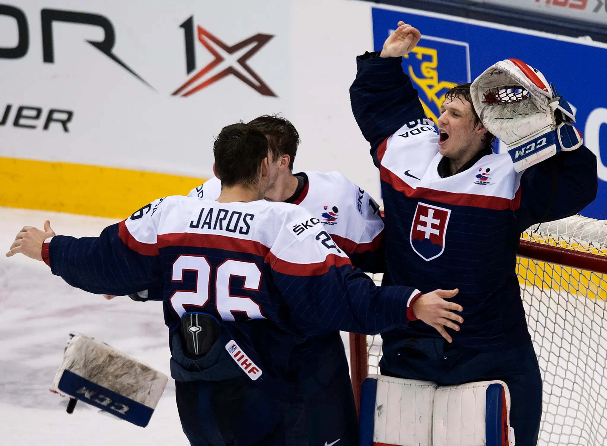 Slovenská bronzová radosť. Zľava: Christián Jaroš, Martin Réway, Denis Godla