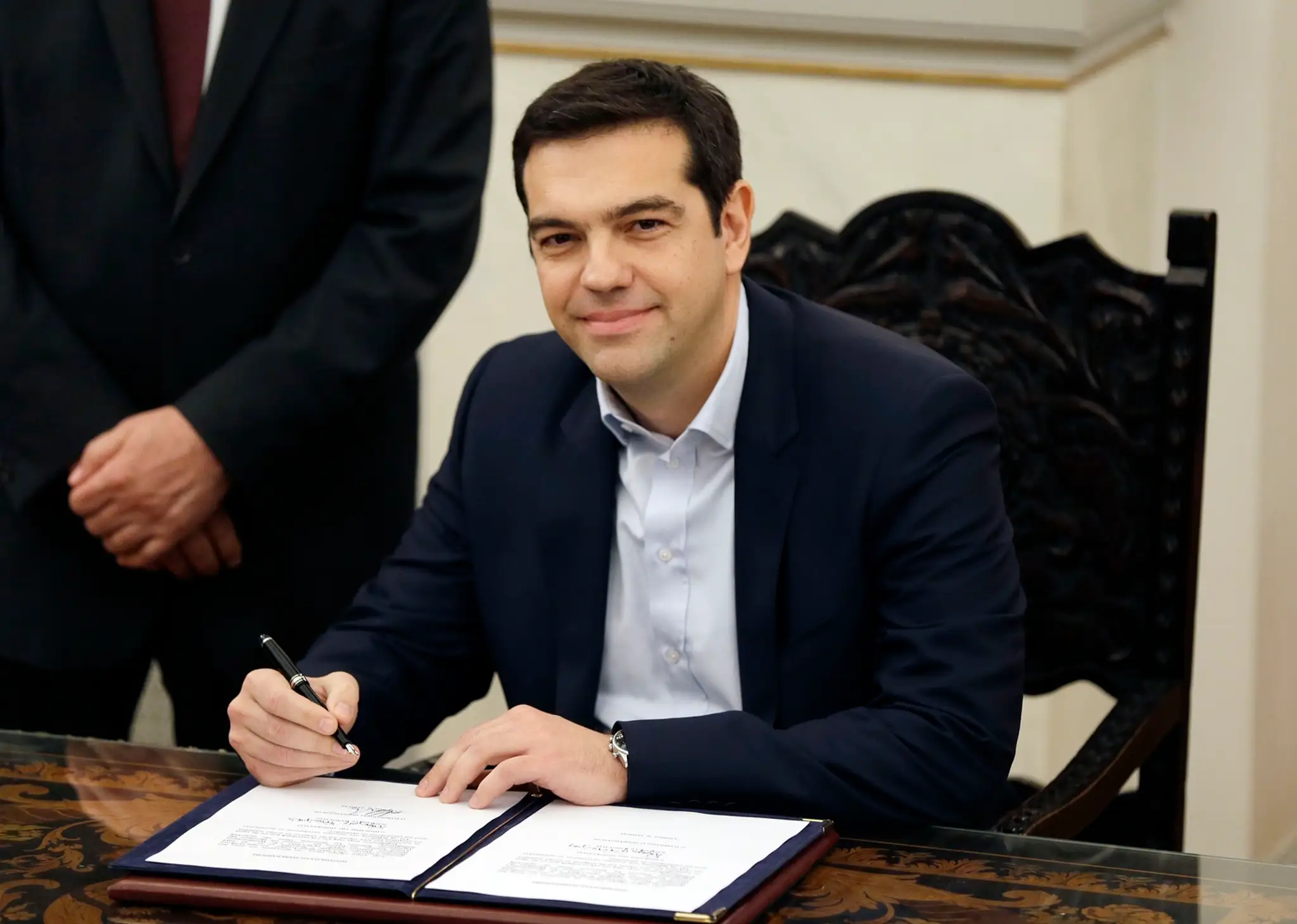 Alexis Tsipras potom, ako zložil prísahu