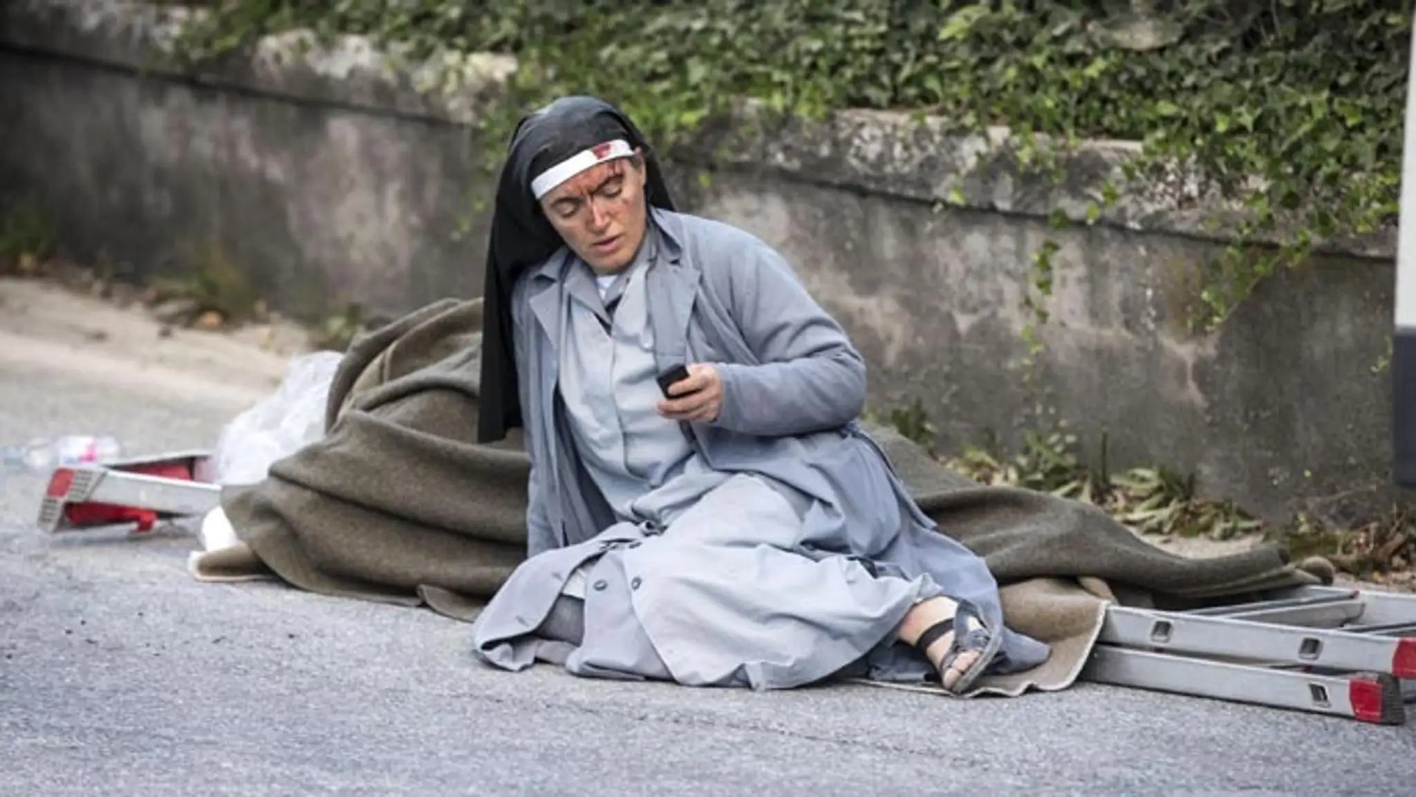 Zranená žena.