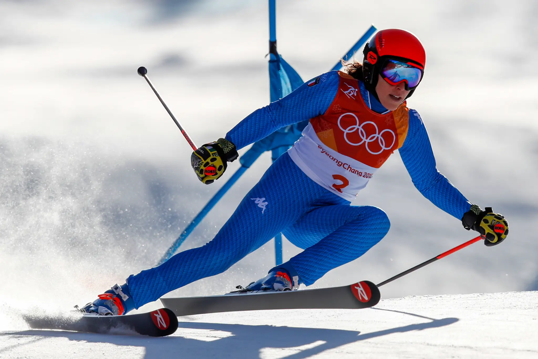 Tri najlepšie pretekárky obrovského slalomu na ZOH 2018 - zľava druhá Mowincklelová, víťazka Shiffrinová a tretia Brignonenová.