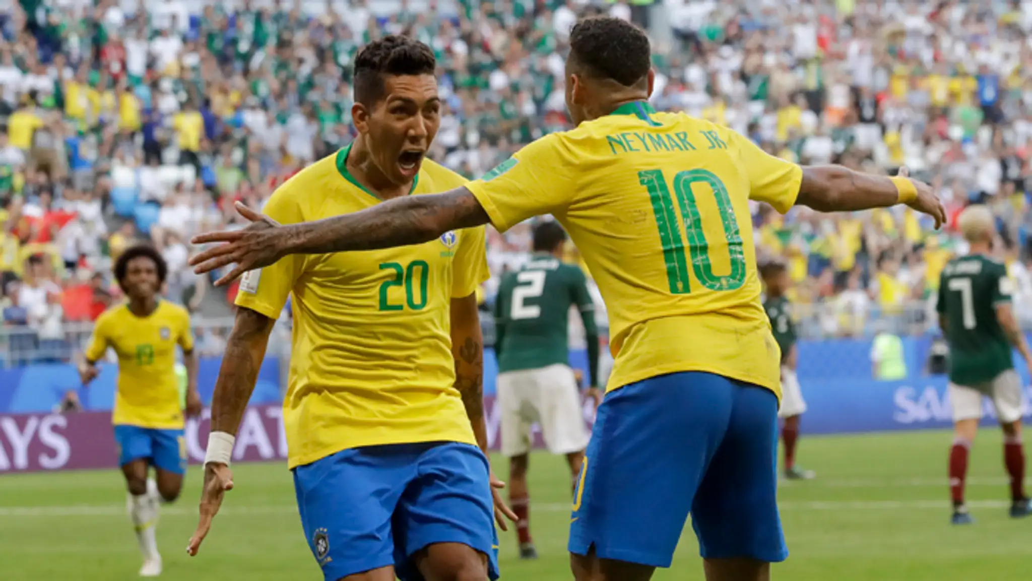 Autori dvoch brazílskych gólov v osemfinále Roberto Firmino (vľavo) a Neymar.