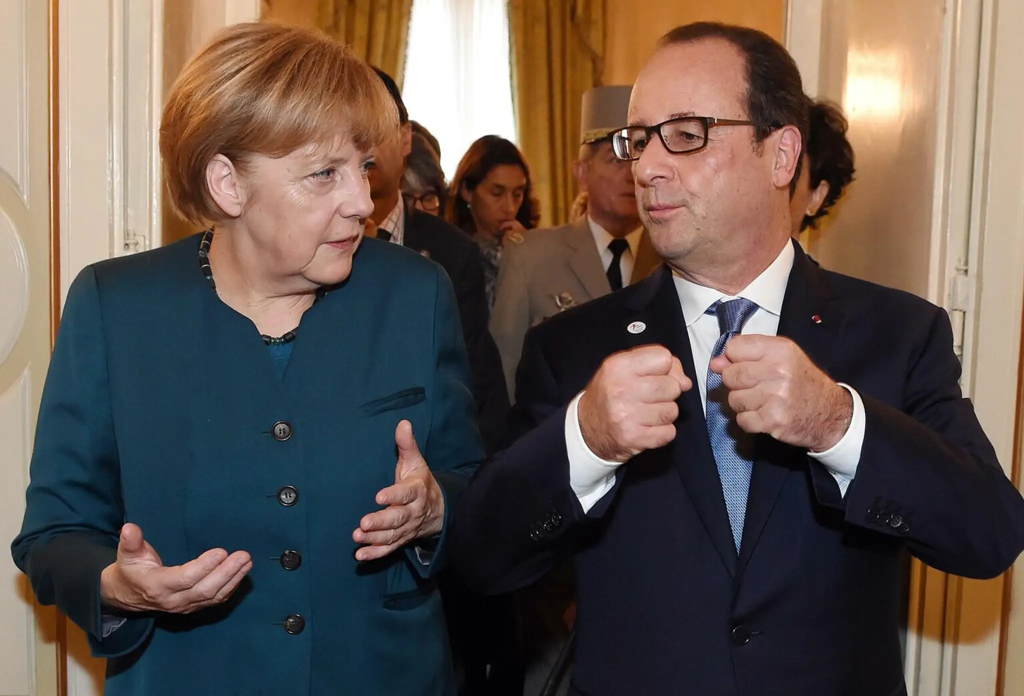 Merkelová Hollande