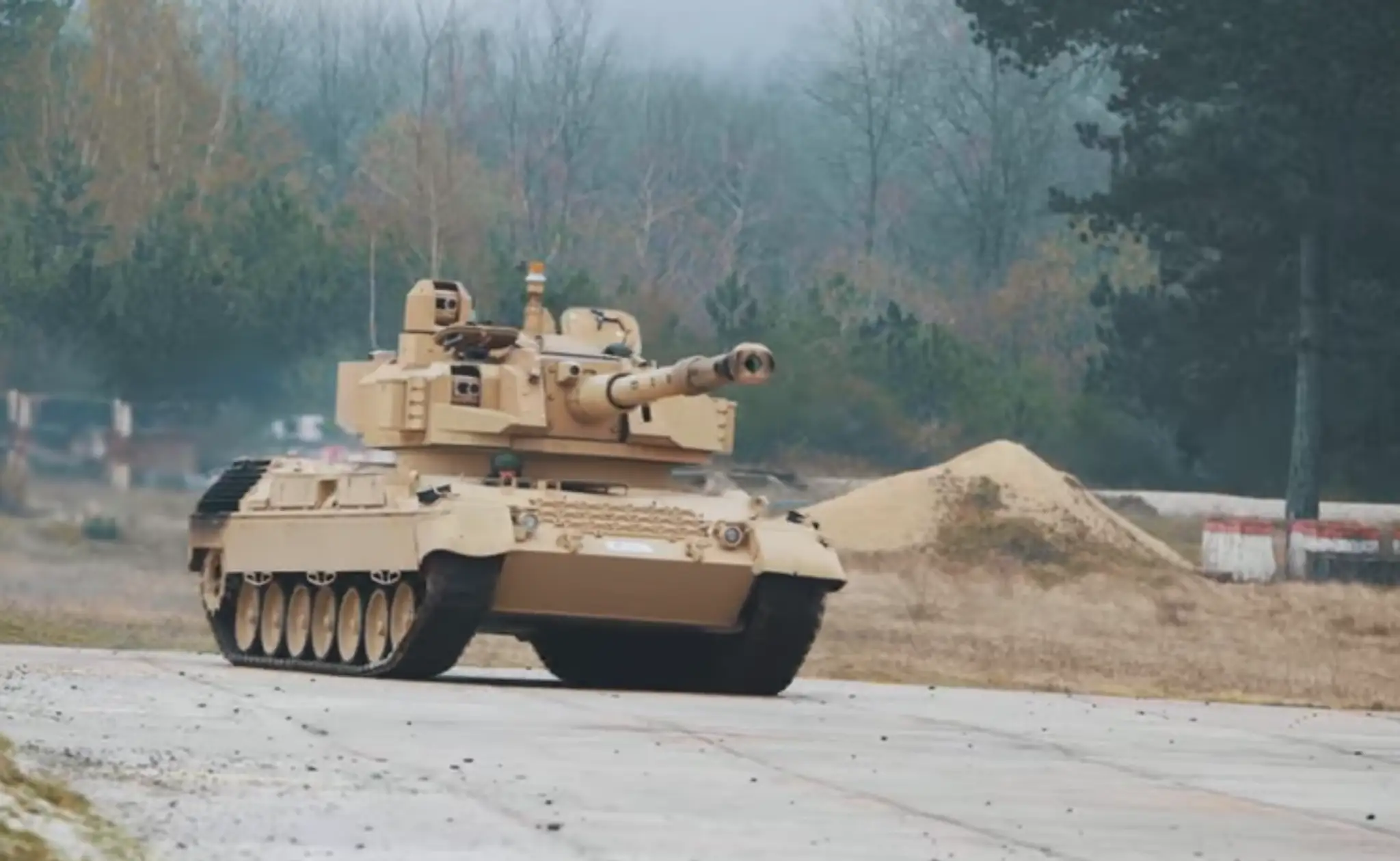 Leopard 1A5 s vežou Cockerill 