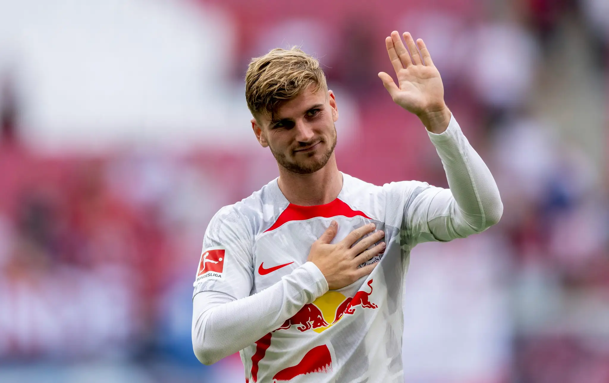 Navrátilec v tíme Lipska Timo Werner reaguje po dueli s Kolínom.