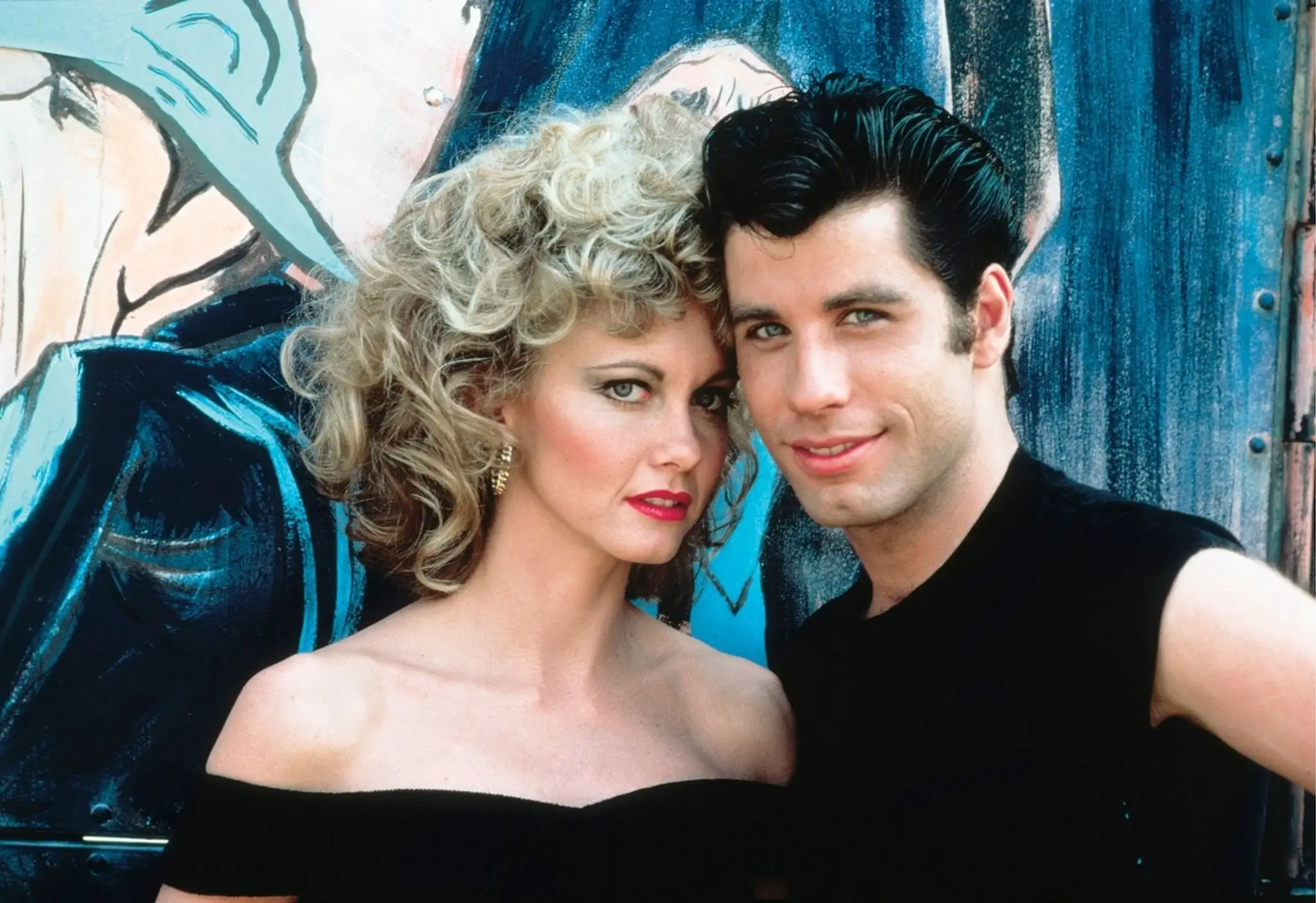 Olivia Newton-John a John Travolta ako Sandy a Danny