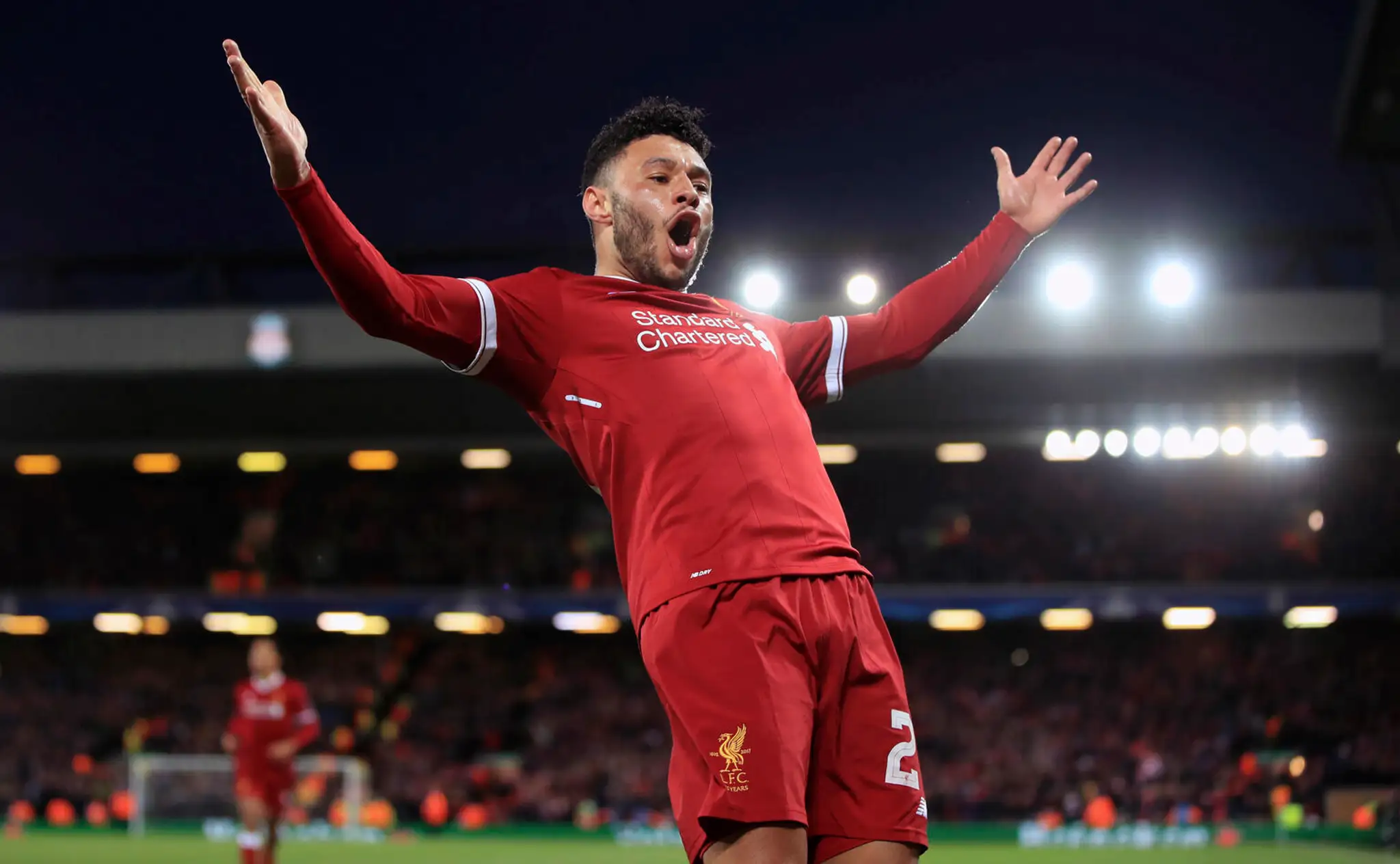 Alex Oxlade-Chamberlain z Liverpoolu jasá po góle v prvom štvrťfinále Ligy majstrov proti ManCity.