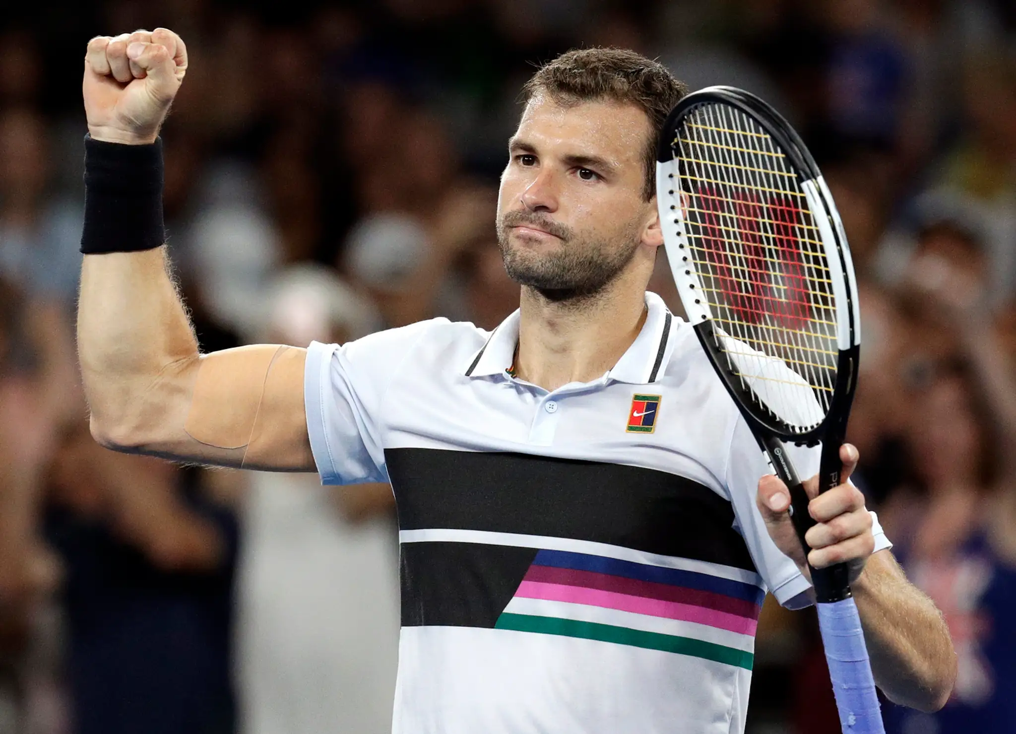 Tenista Grigor Dimitrov v 3. kole na Australian Open.