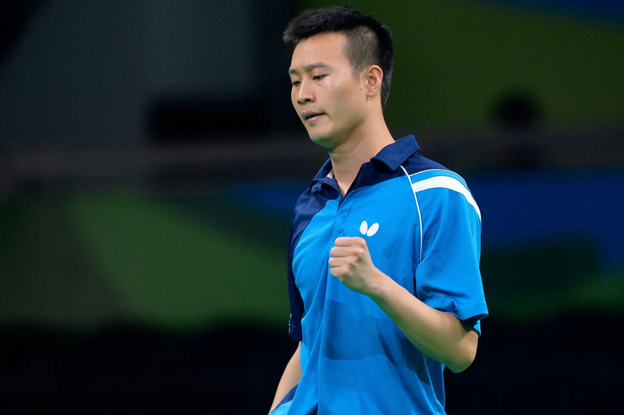Slovenský stolný tenista Jang Wang reaguje v zápase proti Mexičanovi Marcosovi Madridovi.