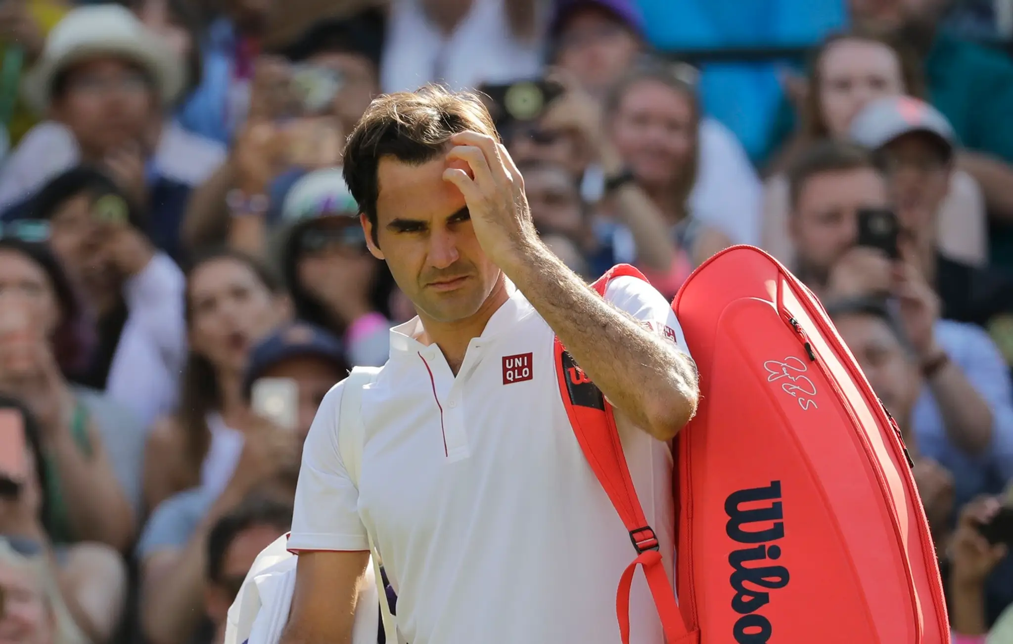 Roger Federer po prehre vo štvťfinále Wimbledonu s Kevinom Andersonom.