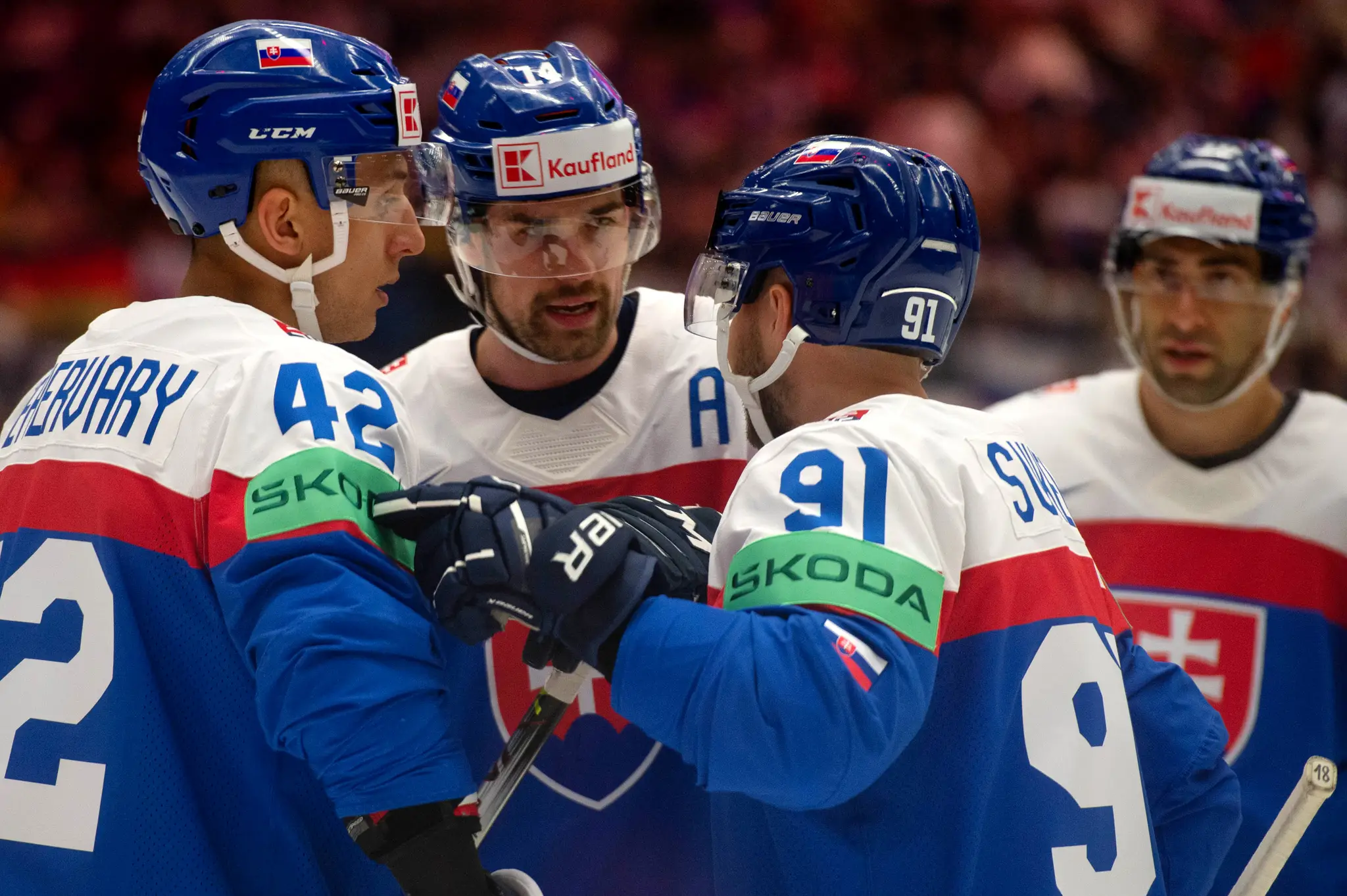 Na snímke slovenskí hokejisti zľava Martin Fehérváry, Peter Čerešňák a Matúš Sukeľ