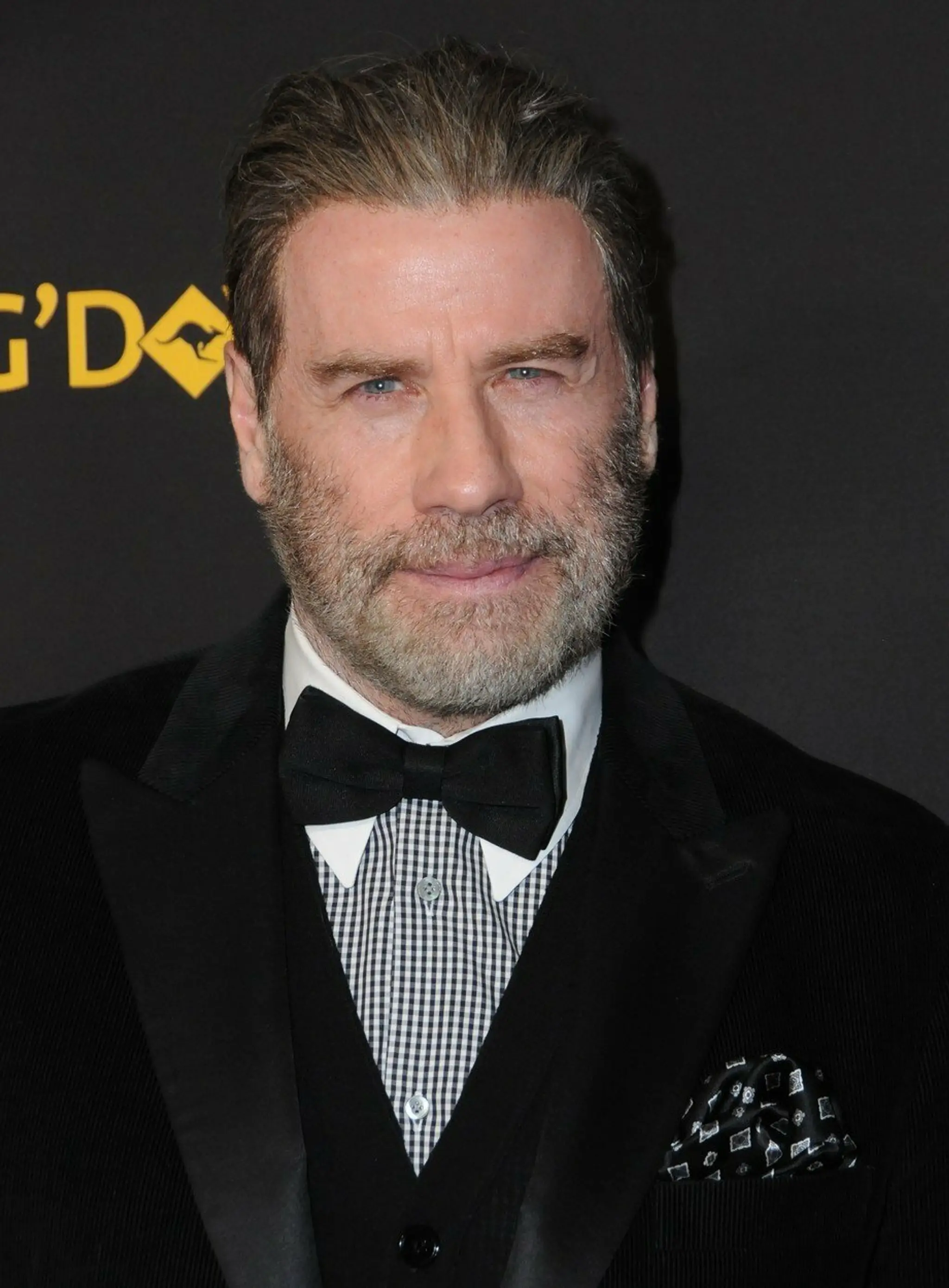 John Travolta (vľavo) a Olivia Newton-John (v strede) na G'Day USA