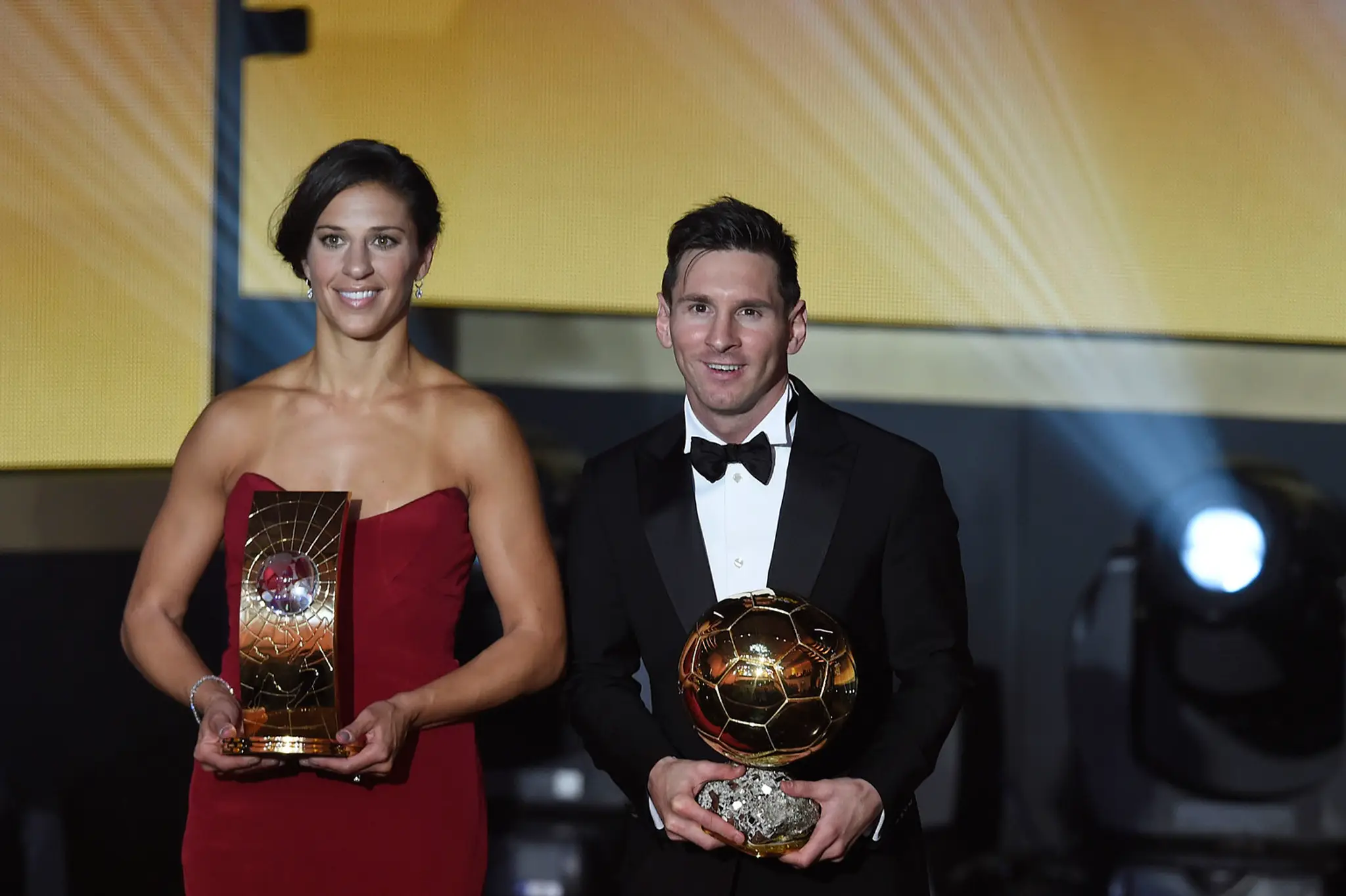 Argentínsky futbalista Lionel Messi a americká futbalistka Carli Lloydová.