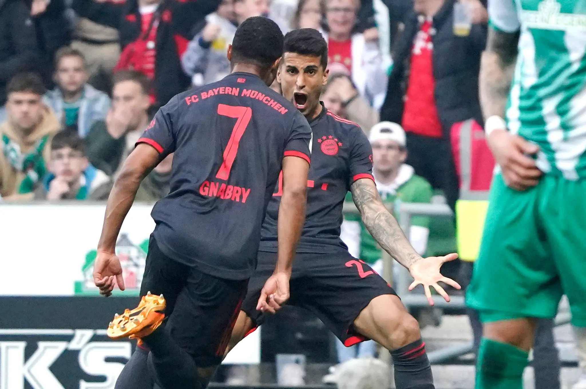 Radujúci sa hráči Bayernu Mníchov