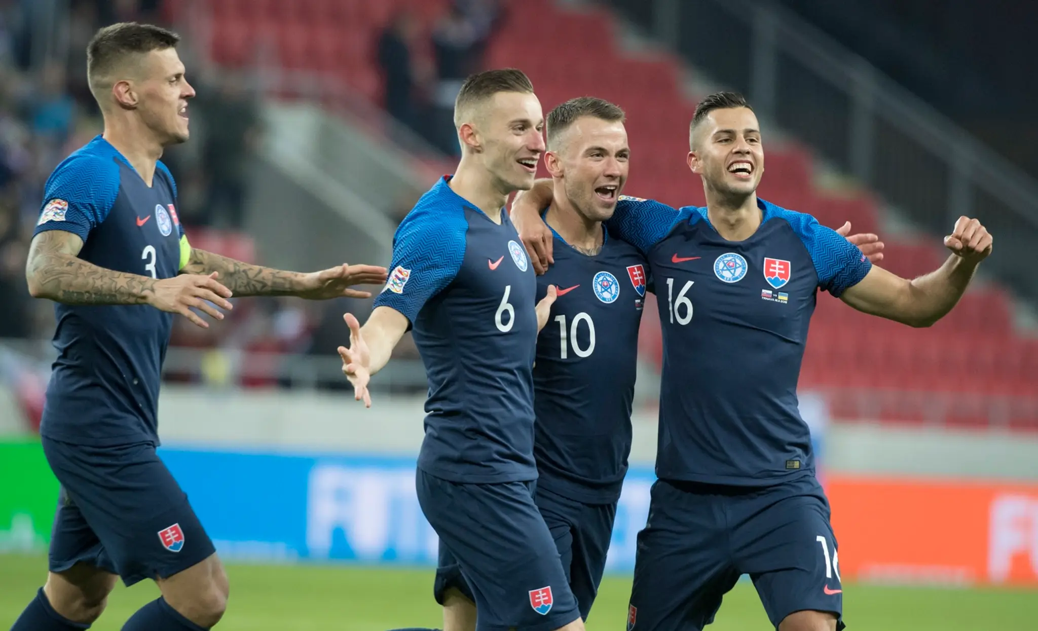 Na snímke sprava David Hancko, Albert Rusnák, Ján Greguš a Martin Škrtel sa radujú po strelení gólu.
