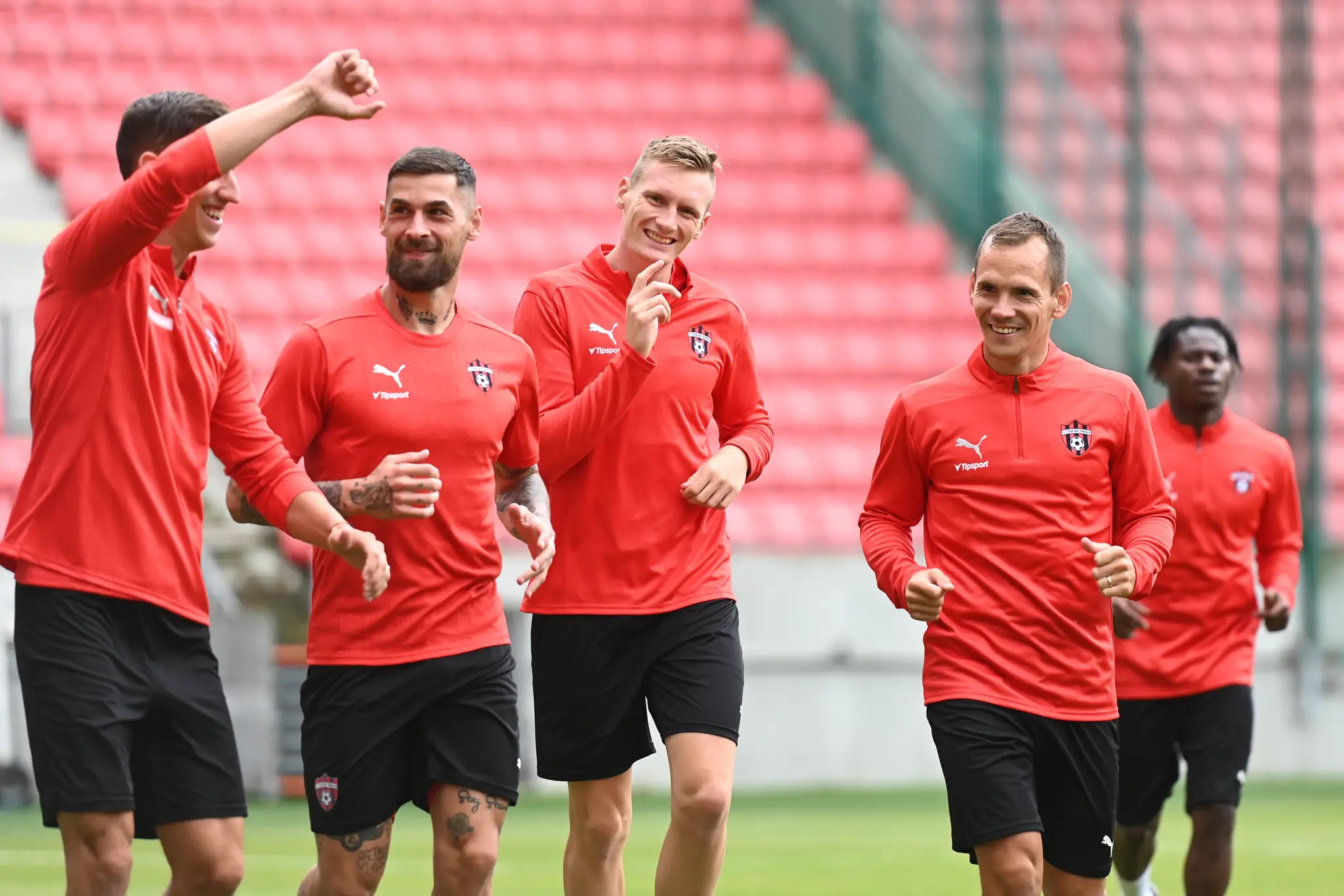 Hráči Trnavy Jakub Paur, Erik Daniel, Patrick Karhan a Martin Mikovič počas tréningu