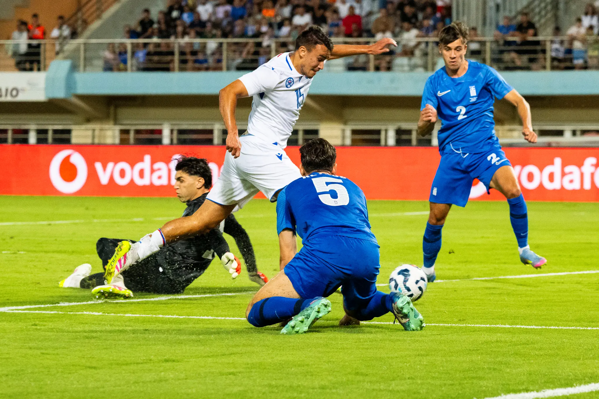 Na snímke zľava grécky brankár Christos Mandas, Dávid Strelec (Slovensko), Panagiotis Retsos a Giorgos Vagiannidis.