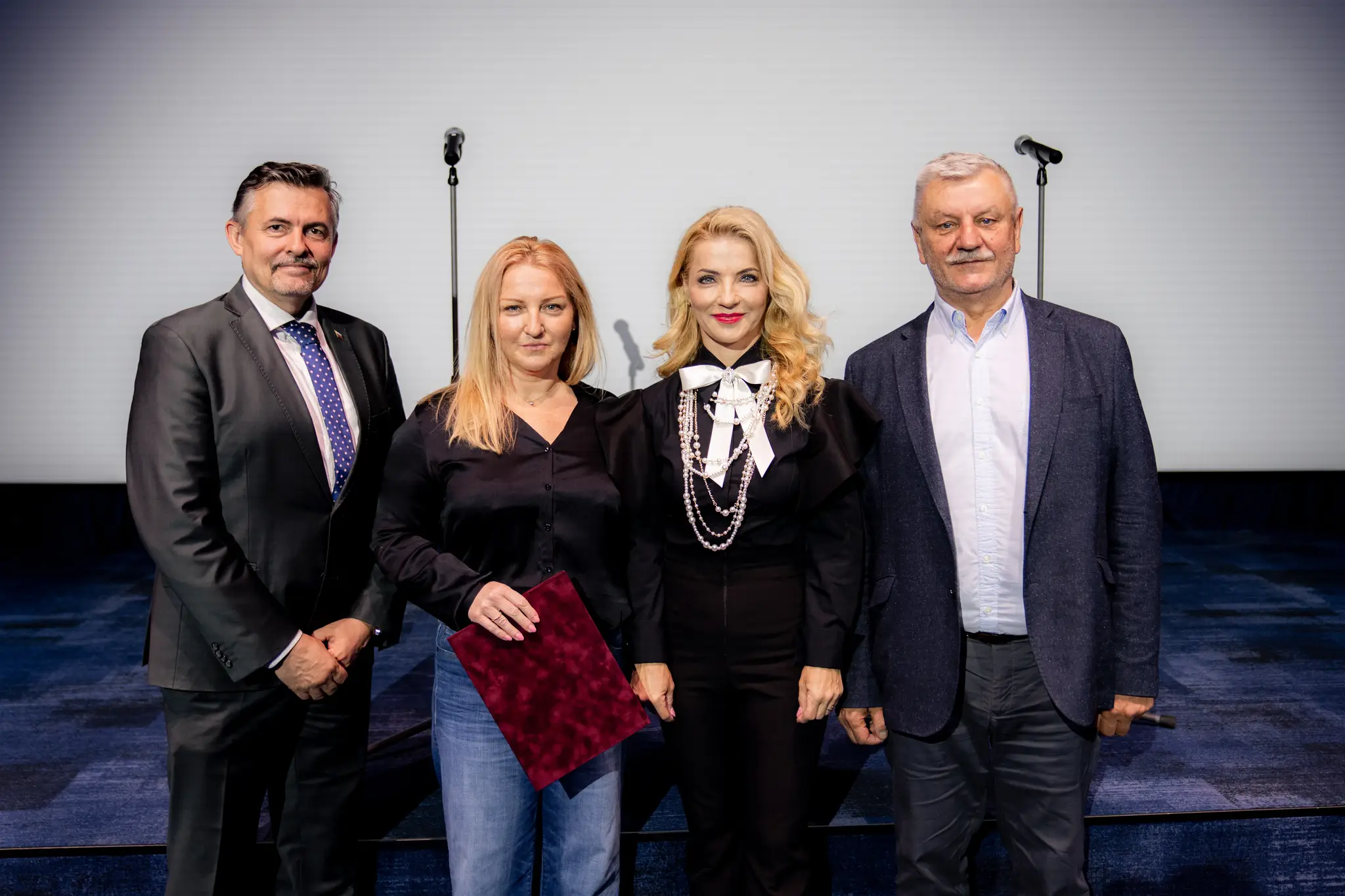 Na snímke zľava generálny tajomník služobného úradu Ministerstva kultúry (MK) SR Lukáš Machala, nová generálna riaditeľka STVR Martina Flašíková, ministerka kultúry SR Martina Šimkovičová (nominantka SNS) a predseda Rady STVR Jozef Krošlák.
