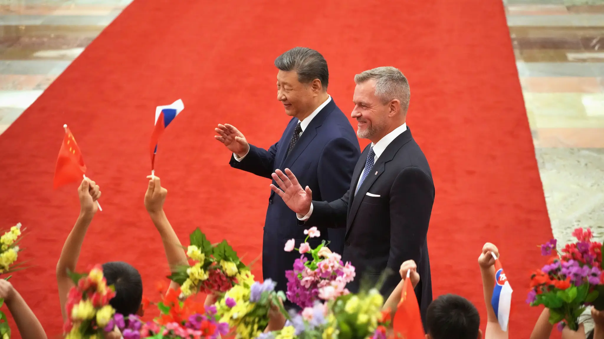 Čínsky prezident Si Ťin-pching a slovenský prezident Peter Pellegrini